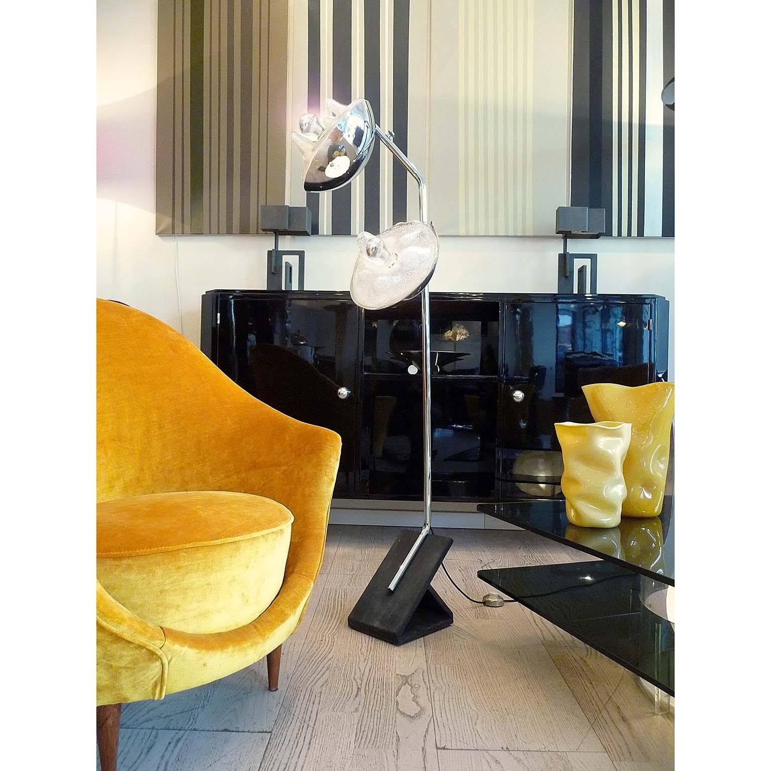 A beautiful floor lamp realized in bollicine glass diffusers (glass with small air bubbles inside), supported by chromed semi spheres, mounted on a vertical stem. Top light can be adjusted and rotated. Metal base made of very heavy patinated iron