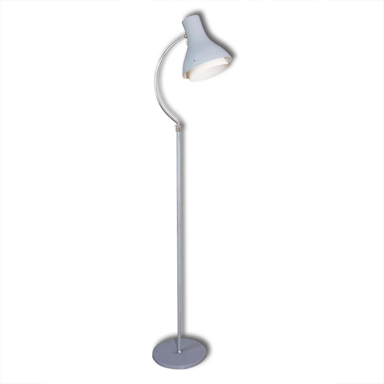 Midcentury vintage metal floor lamp designed by Josef Hurka for Napako associated with “Brussels period” and world-renowned EXPO58. The lamp features the slender leg and neutral blue-grey color, chrome-plated construction, lampshade adjustable to