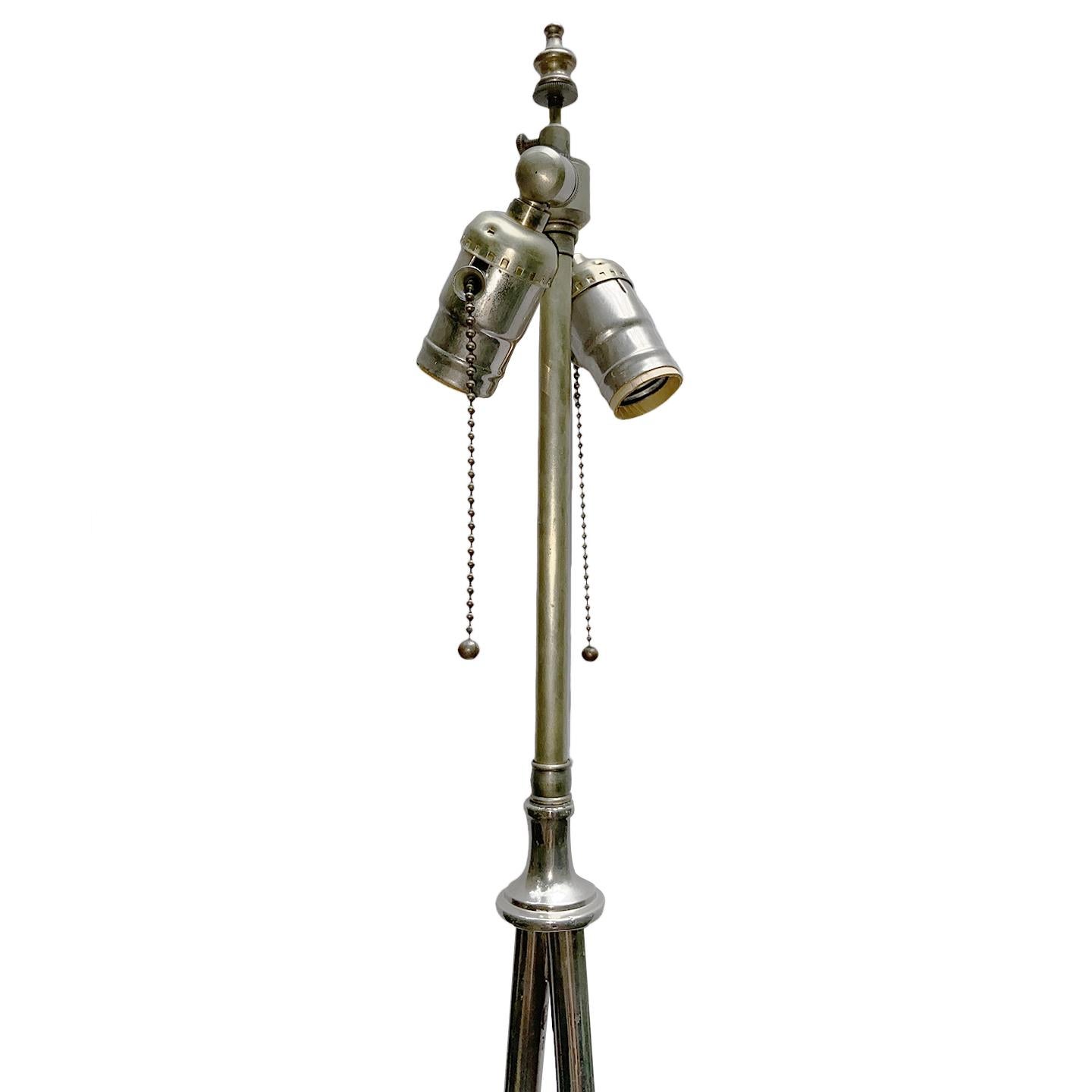 A single circa late 1940's moderne style nickel-plated Italian floor lamp.

Measurements:
Height of body: 50.5