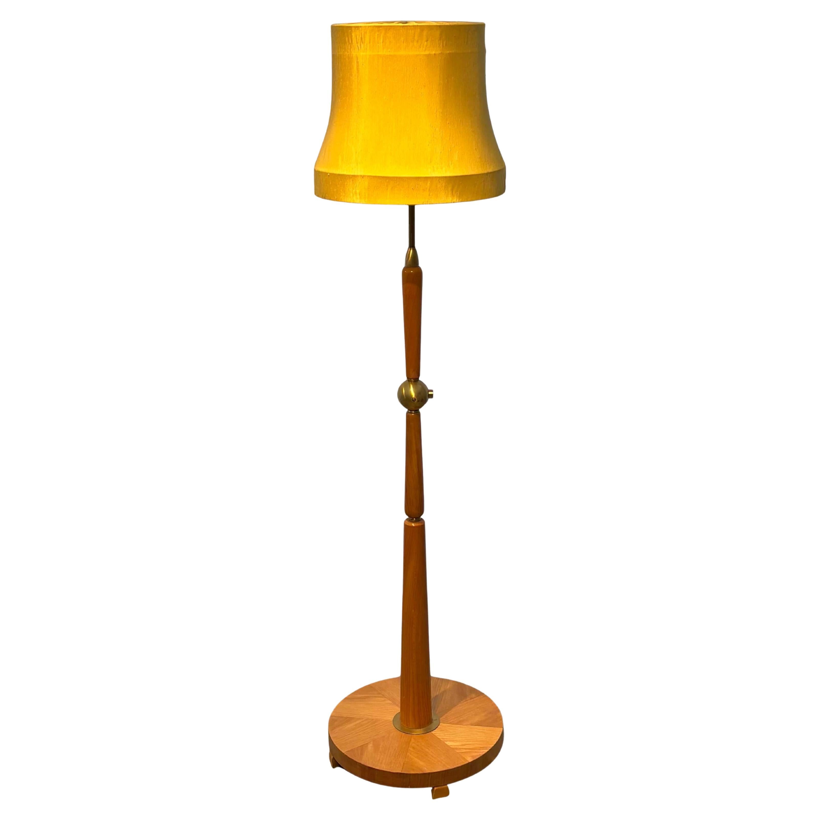 Mid century floor lamp, Ivar Fransson, IWO, brass 
birch, Swedish Modern, 1940s