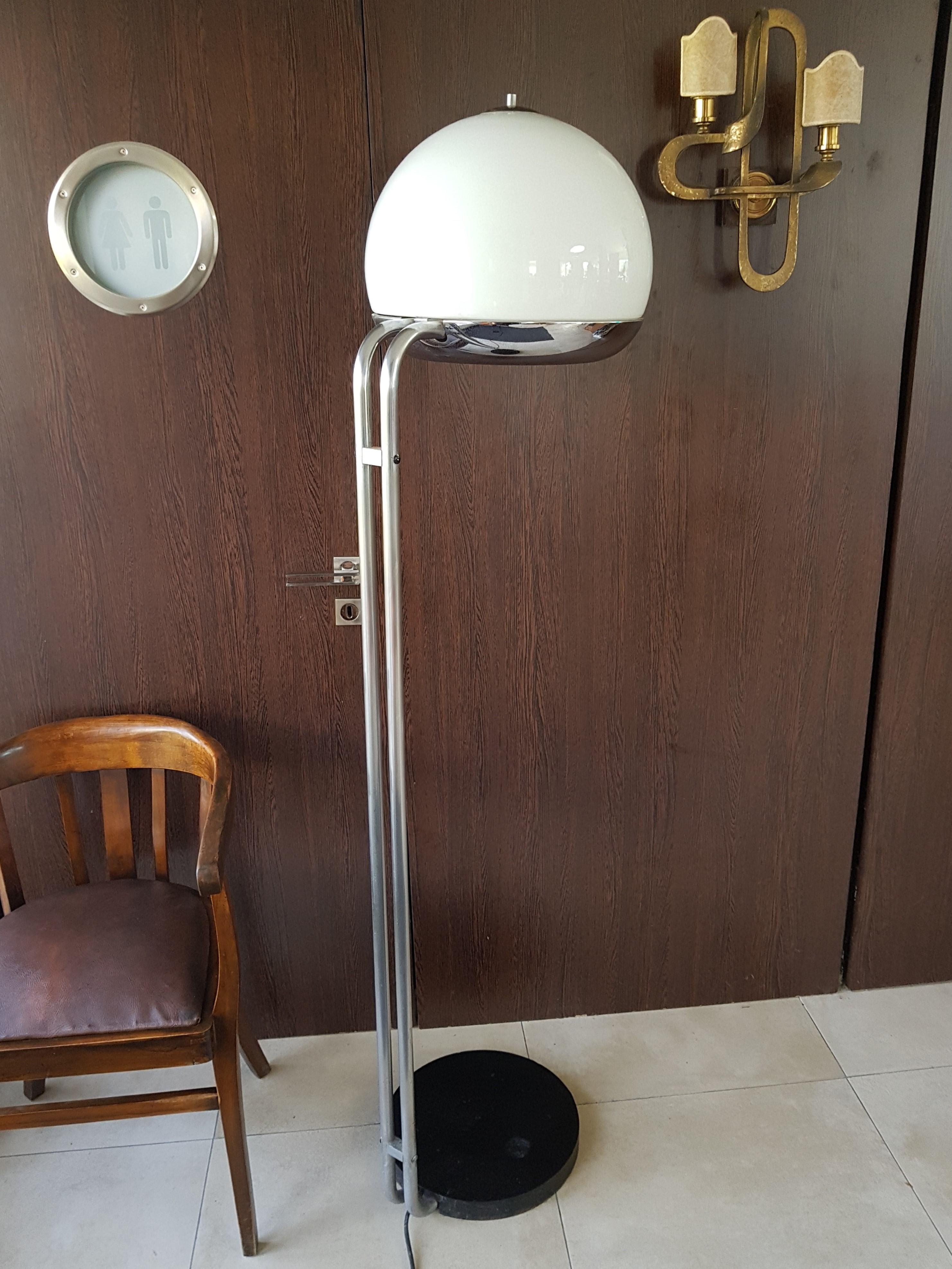 Mid-century floor lamp Reggiani, Italy, 1960s.

Glass shade. Two separate circuits for two bulbs. Chrome with patina.
Very heavy base.