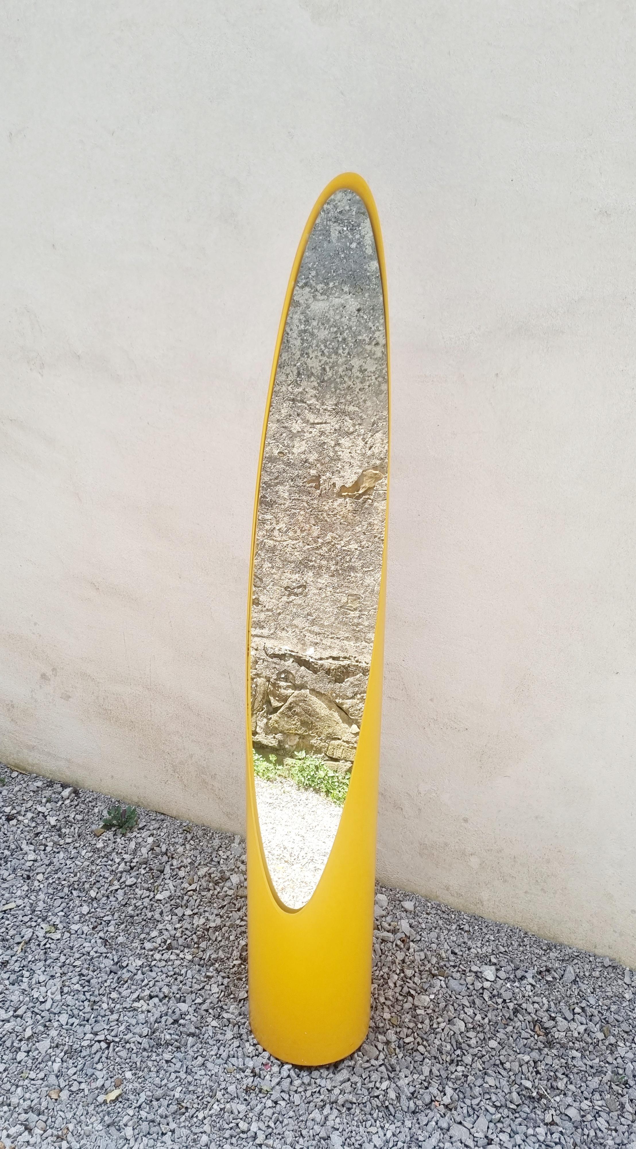 Stunning Mirror, named Unghia (it means nail in Italian; after its characteristic shape).
Designed by Rodolfo Bonetto in Italy in '70s.
It is made wooden base, yellow PVC and glass.
This special Mirror is in very good vintage condition. Really