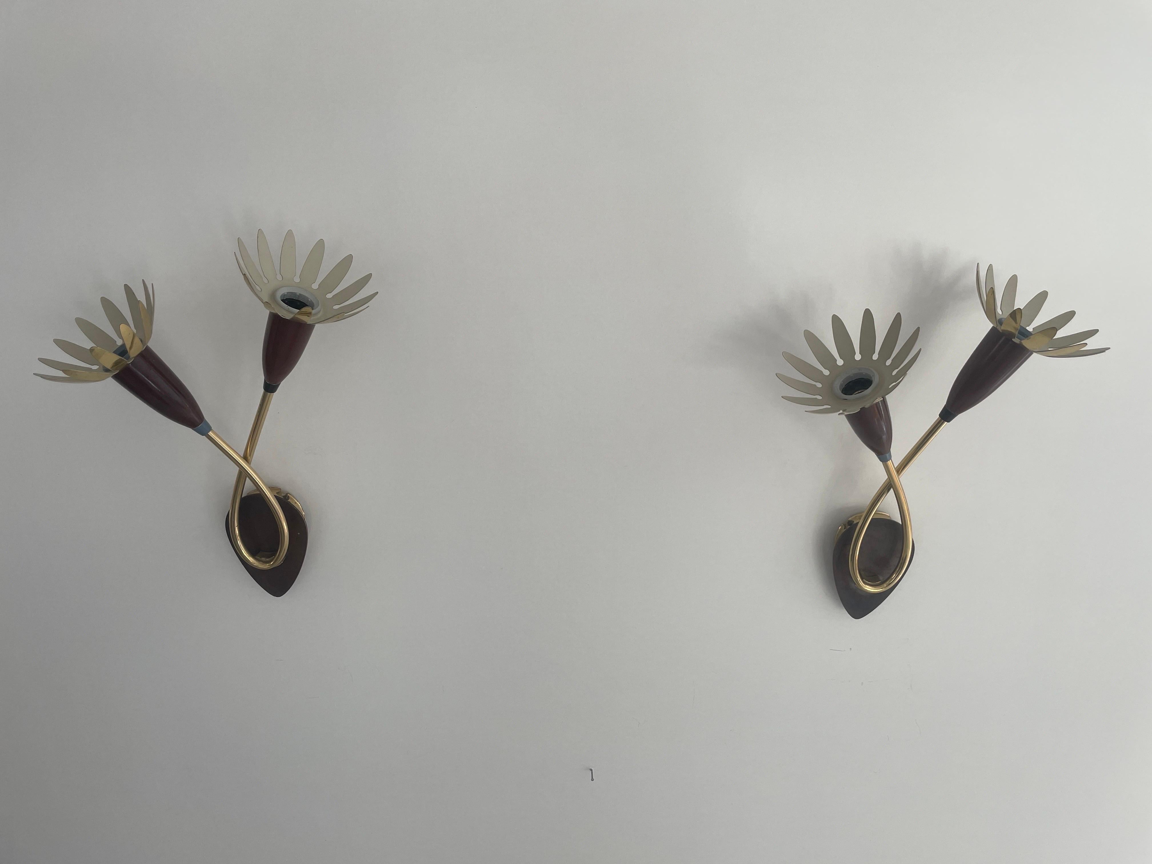Mid-century Flower Design Pair of Sputnik Sconces, 1950s, Germany

Very elegant and Minimalist wall lamps
Lamp is in very good condition.

These lamps works with E14 standard light bulbs. 
Wired and suitable to use in all countries. (110-220