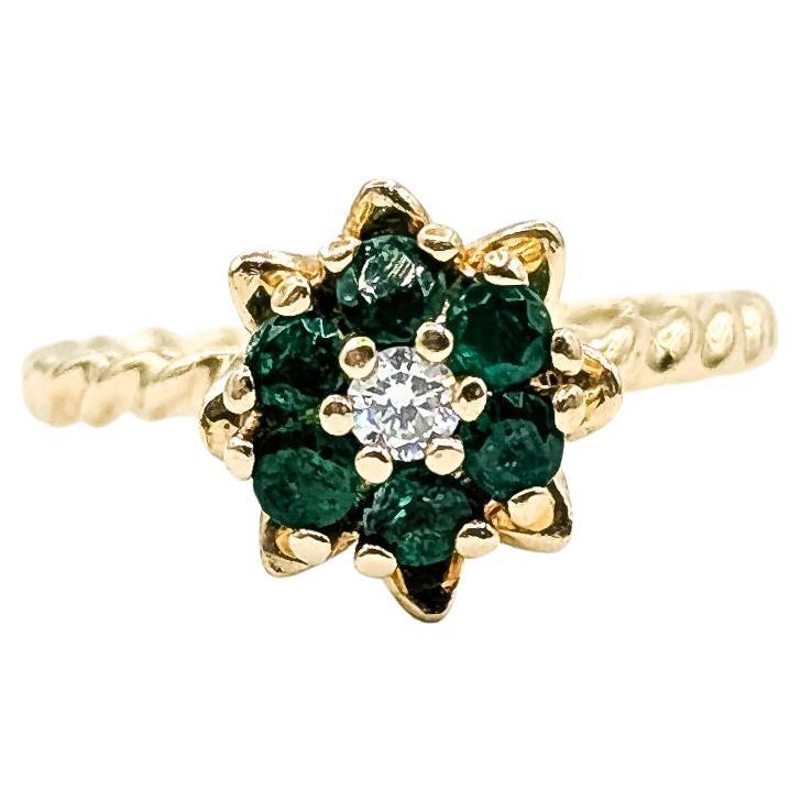 Mid-Century Flower Emerald
Diamond Ring in 14k Yellow Gold