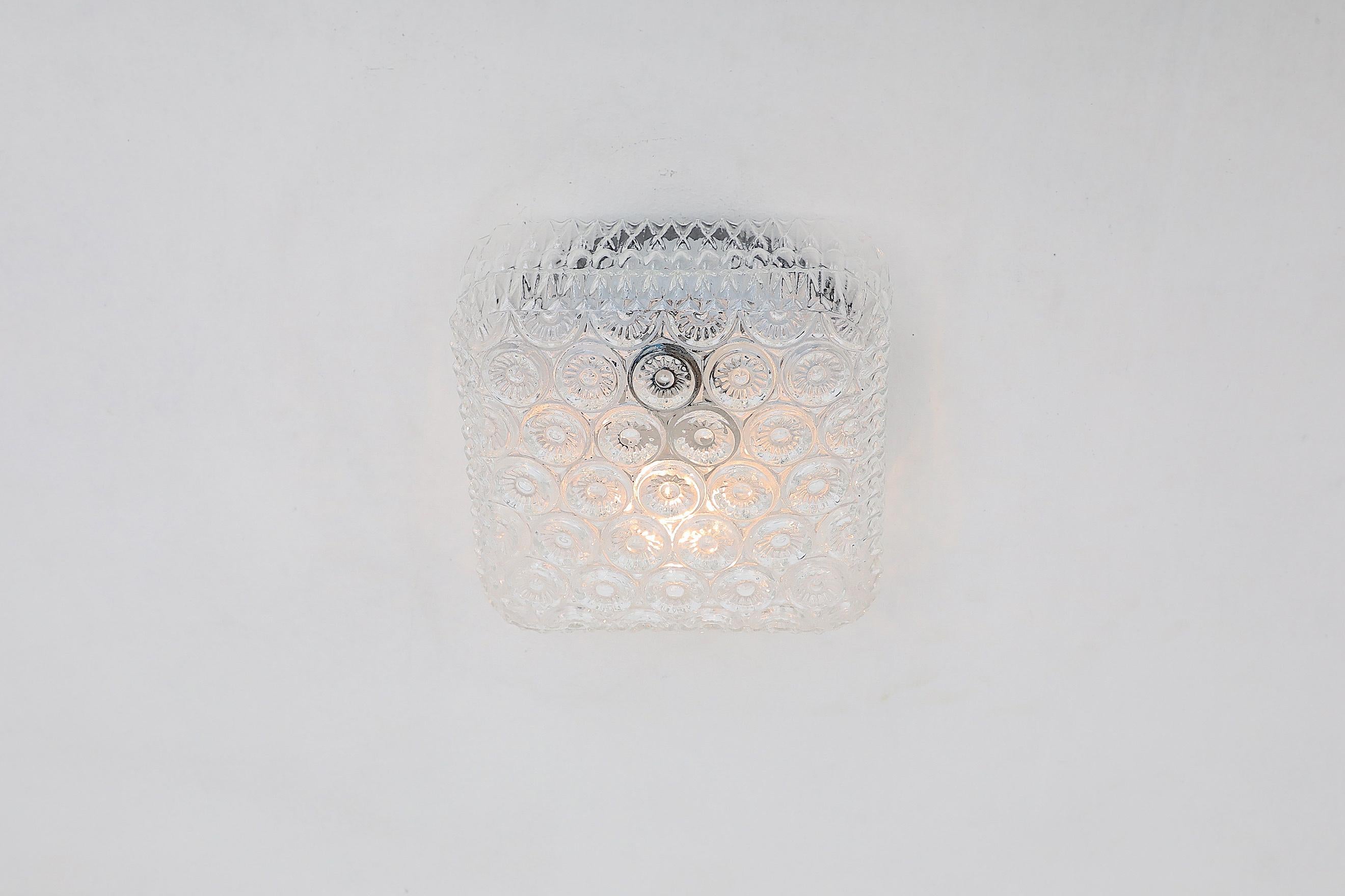 Dutch Mid-Century Flower Power Pressed Glass Sconce For Sale