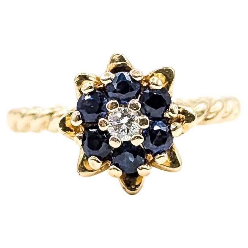 Mid-century Flower Sapphire
Diamond Ring in 14k