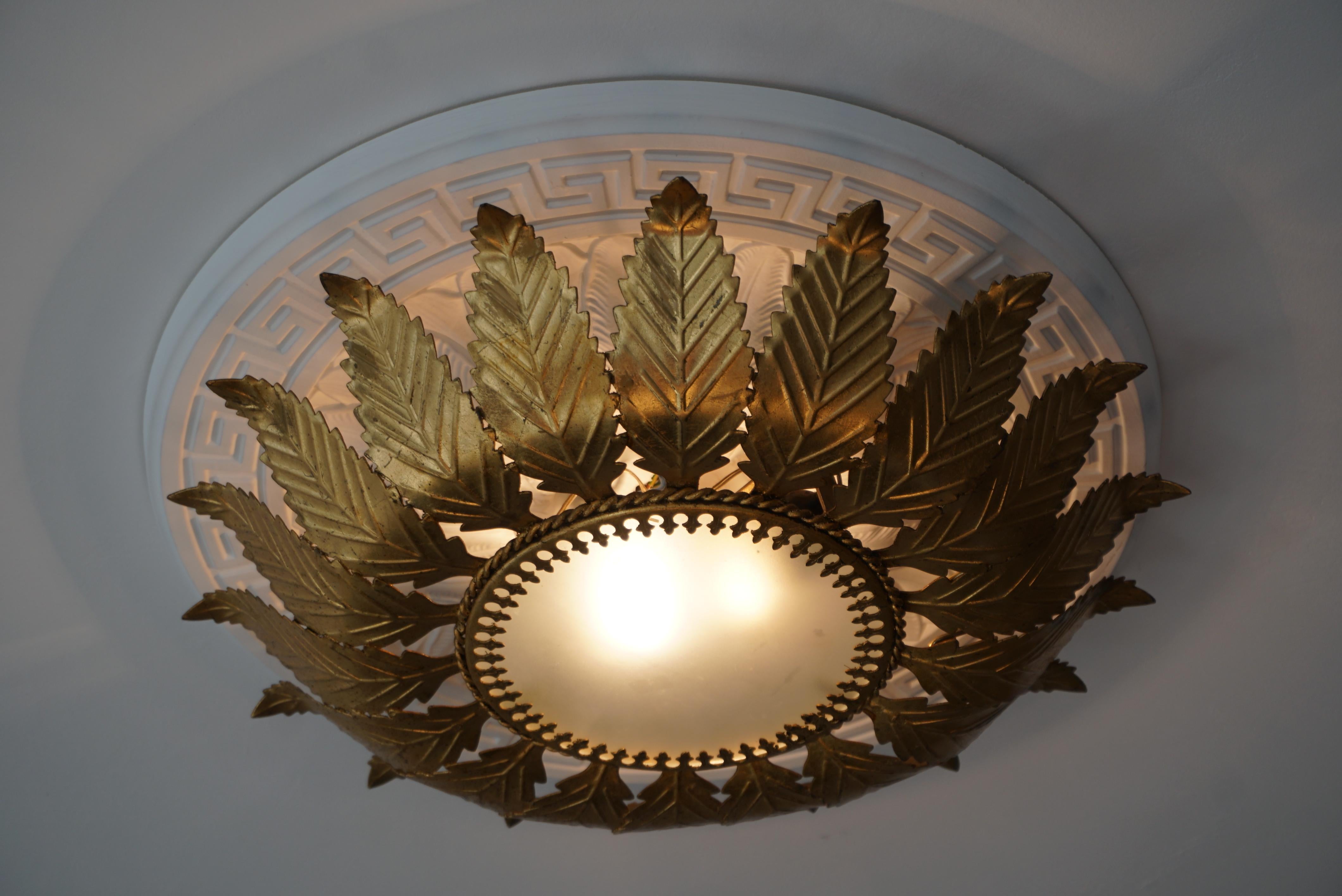Mid Century Flush Mount Sun Covered with Gilt Leaf In Good Condition For Sale In Antwerp, BE