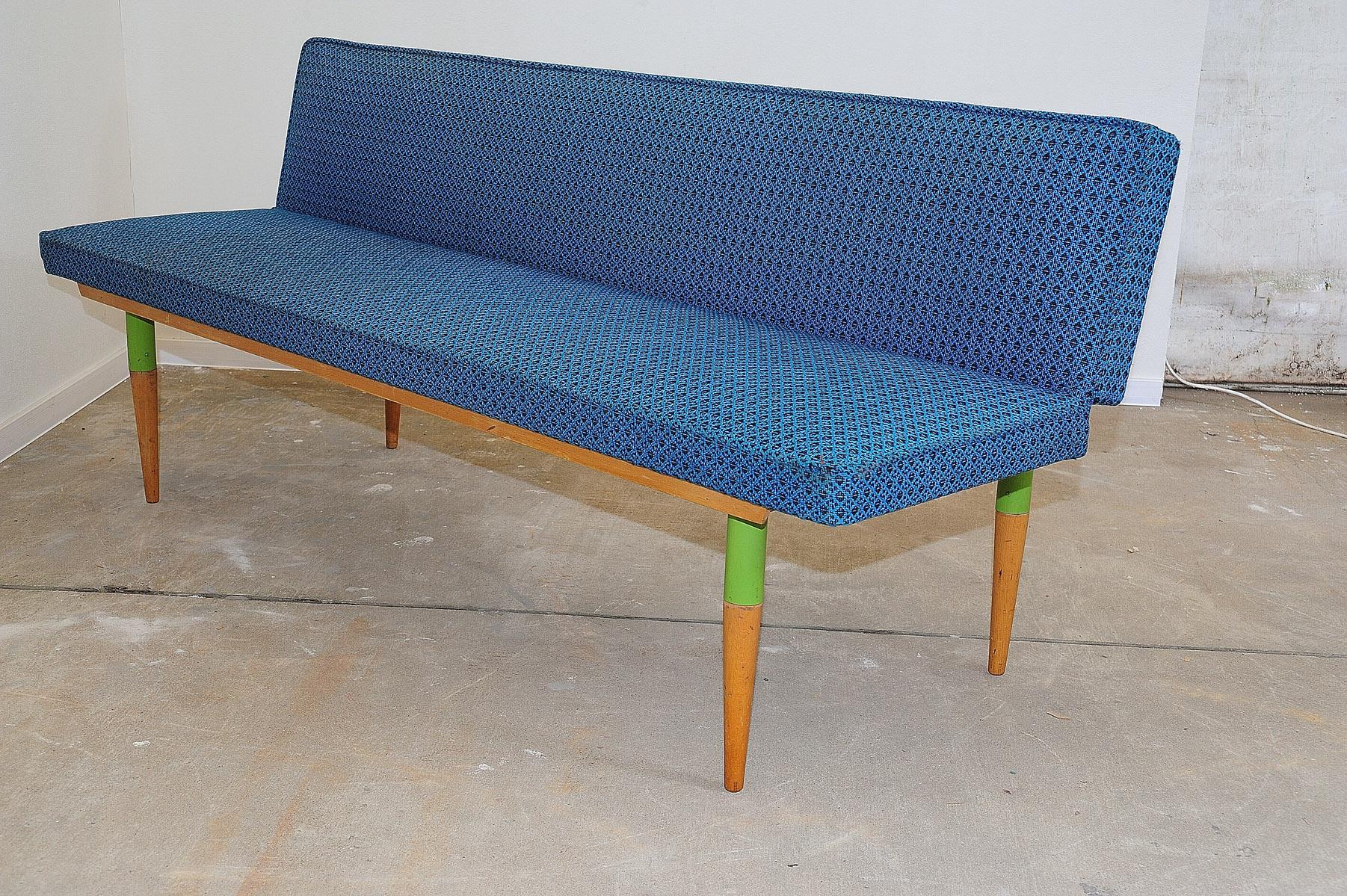 Midcentury sofa/daybed, made in the former Czechoslovakia in the 1960s, designed by Miroslav Navrátil. Material: beechwood, fabric. The sofa showing signs of age and using, but overall is in good preserved Vintage condition,

Measures :

Height: 80