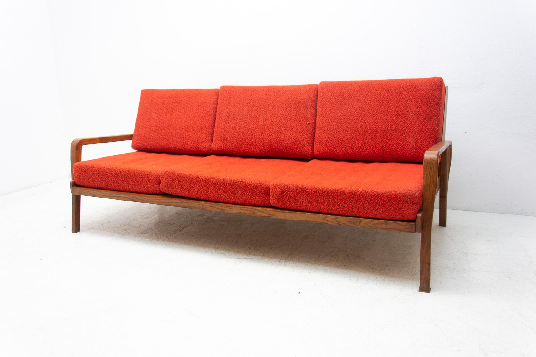 Mid century sofa in Scandinavian style. It was made in the former Czechoslovakia in the 1960´s. This sofa features wooden structure made of beech wood. The sofa is in good Vintage condition, showing signs of age and using.

 

Measures: Lenght: