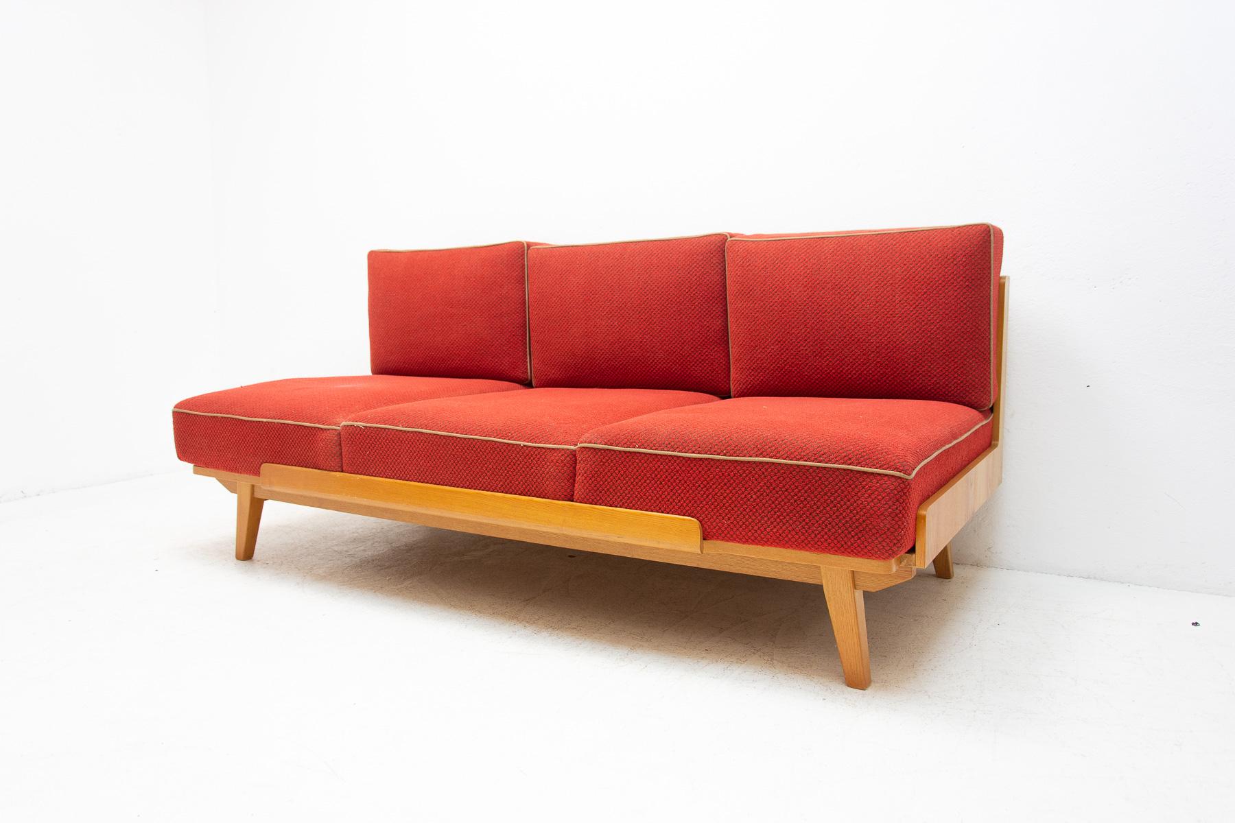 Mid century sofa bed, made in the former Czechoslovakia in the 1960´s. This sofa has a wooden structure, it´s is in good preserved condition, showing signs of age and using.

Measures: Length: 190 cm

Height: 88 cm
Depth: 95 cm

Sleeping