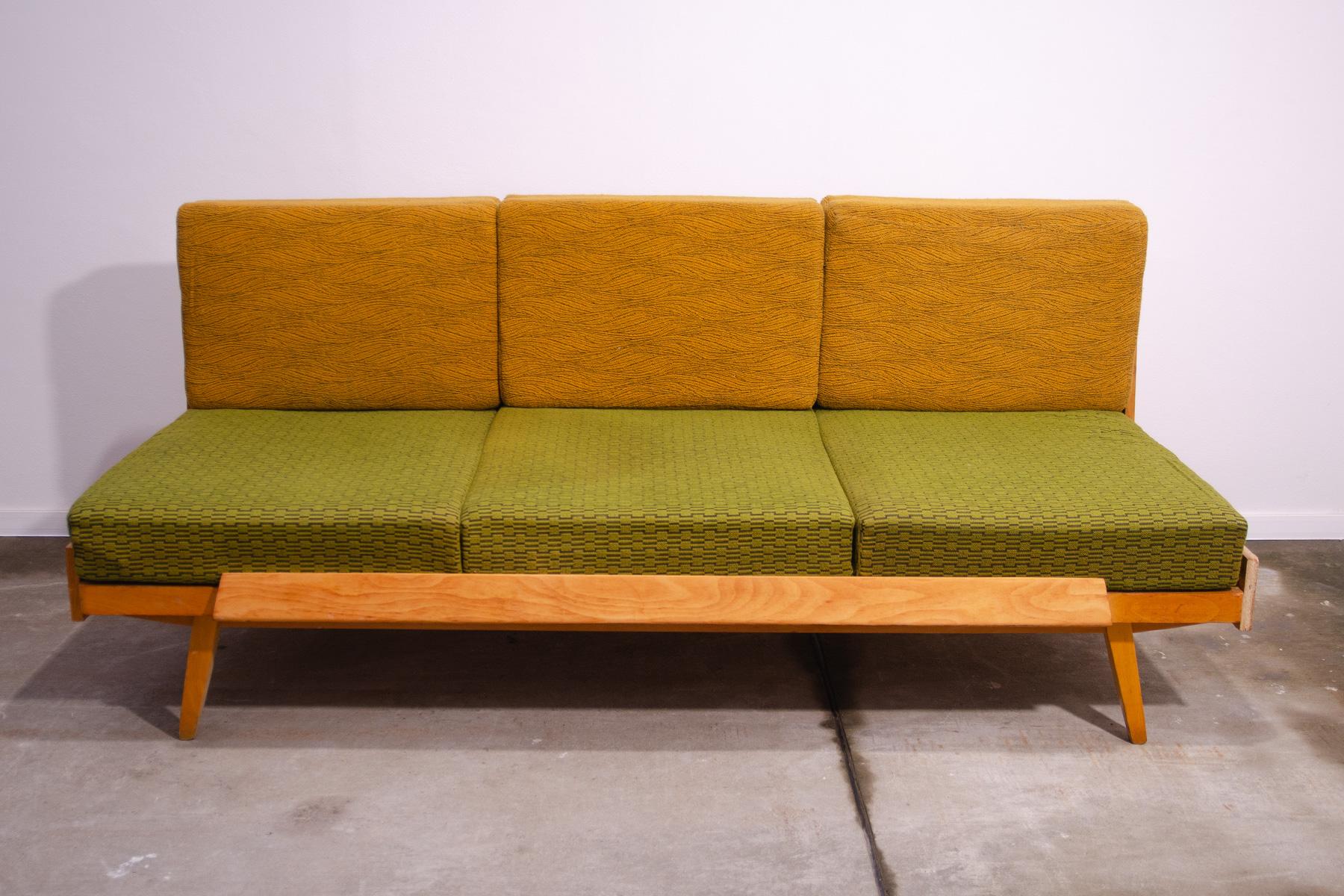 Mid century sofa bed,made in the former Czechoslovakia in the 1970´s. The sofa has a beechwood structure, it´s in good preserved Vintage condition, showing signs of age and using(as you can see in the photos).

Lenght:     199 cm

Height:     86