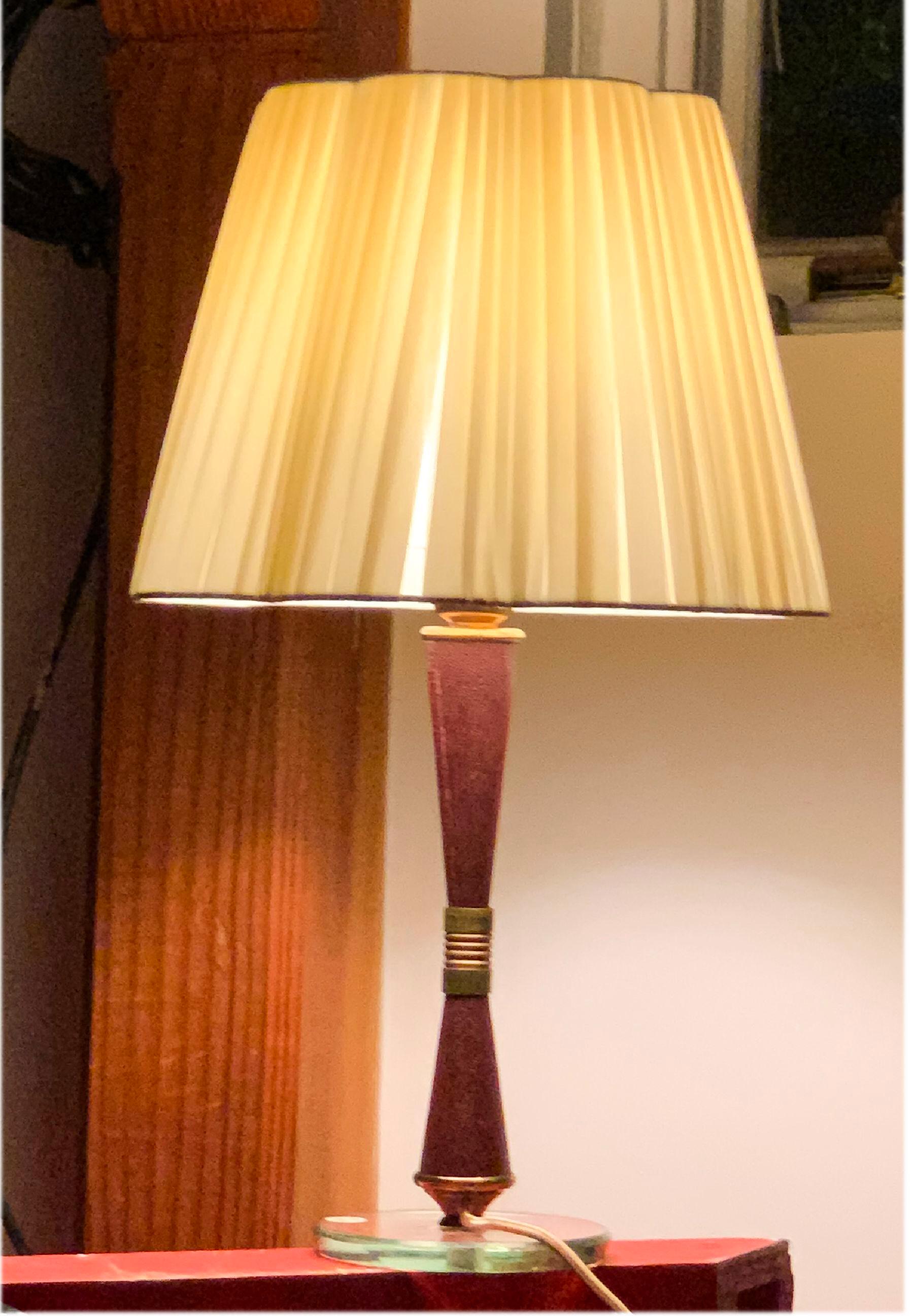 Midcentury Fontana Arte corseted leather, brass and glass table lamp, scalloped silk shade with pleats. Original wiring works. Lovely proportions. Restrained organicism. Italian modern at its finest.