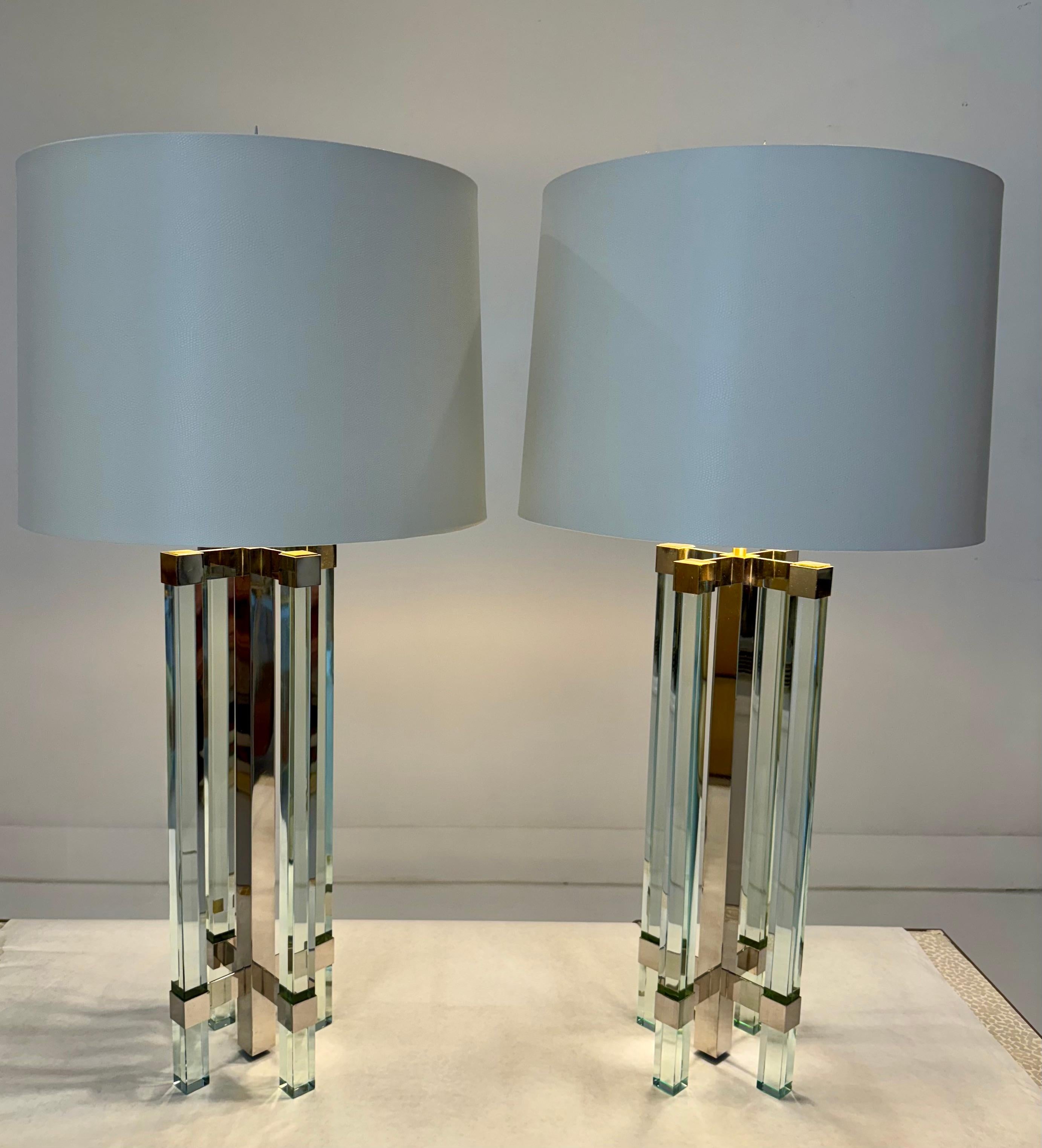 A striking pair of table lamps designed by Max Ingrand for Fontana Arte, Italy, circa 1950s. These sculptural lamps are a quintessential example of Ingrand’s refined aesthetic, blending modernist form with luxurious materials. Each lamp features