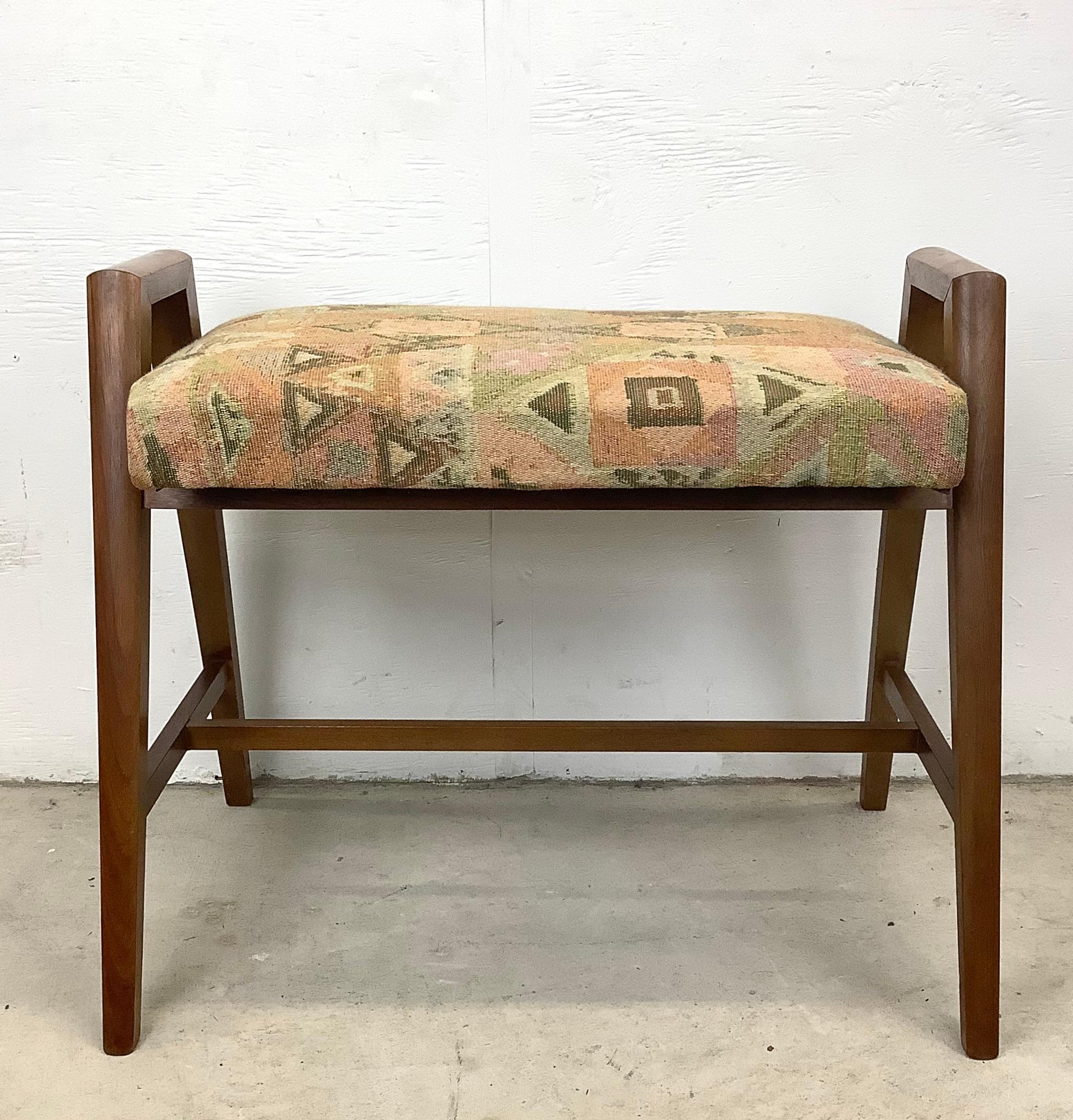 This mid-century piano bench from Manual Arts, USA was iconically paired with the Baldwin Acrosonic Spinet Piano and features sculptural wooden frame. The mix of minimalist mcm style and timeless comfort make this a subtle mcm statement piece for