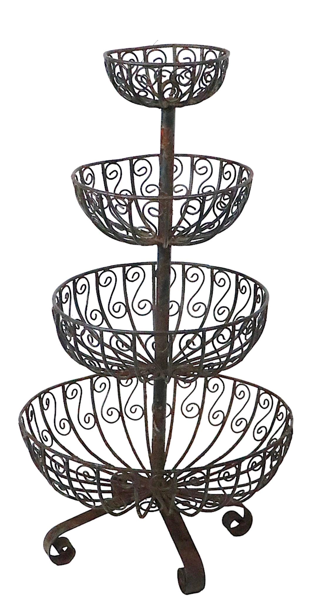 French Provincial Mid Century Four Tier Wrought Iron Wire Work Planter with Graduated Size Basins For Sale