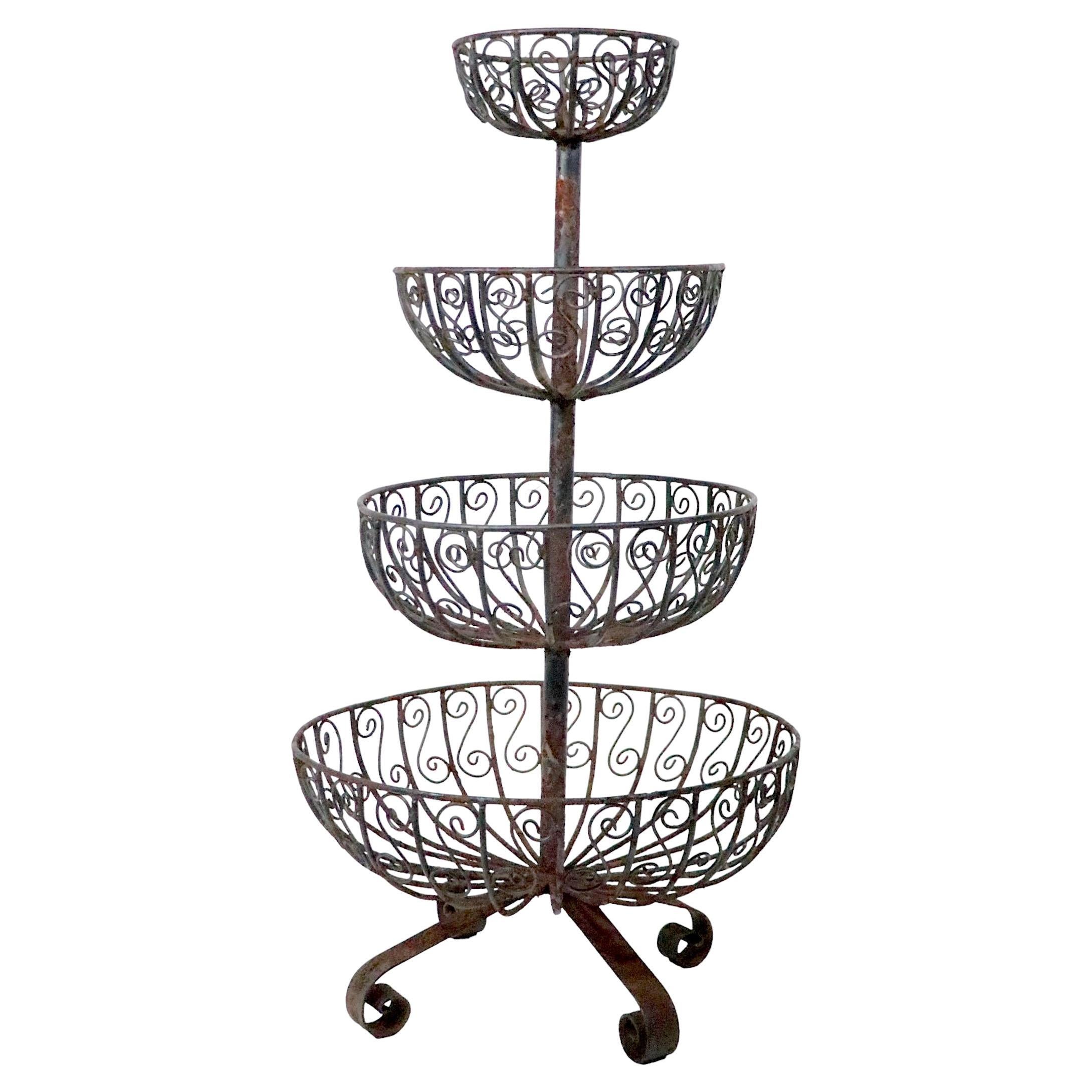 Mid Century Four Tier Wrought Iron Wire Work Planter with Graduated Size Basins For Sale