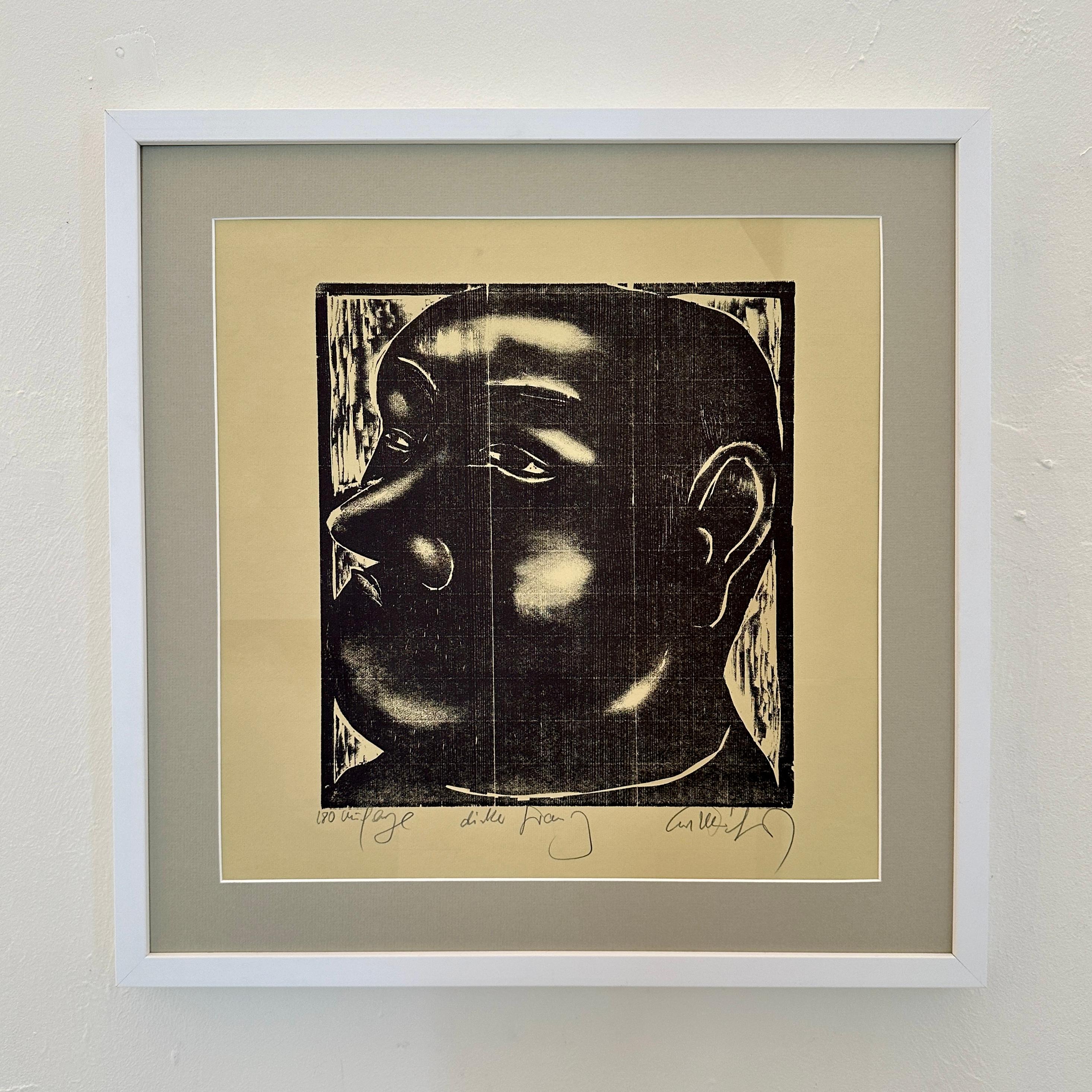 Crafted around 1970, this Mid Century Framed Linoleum Cut on Paper captures the essence of a bygone era. The portrait, depicting a man, exudes a timeless charm and character. 
Created through the meticulous linoleum cut technique, it showcases the