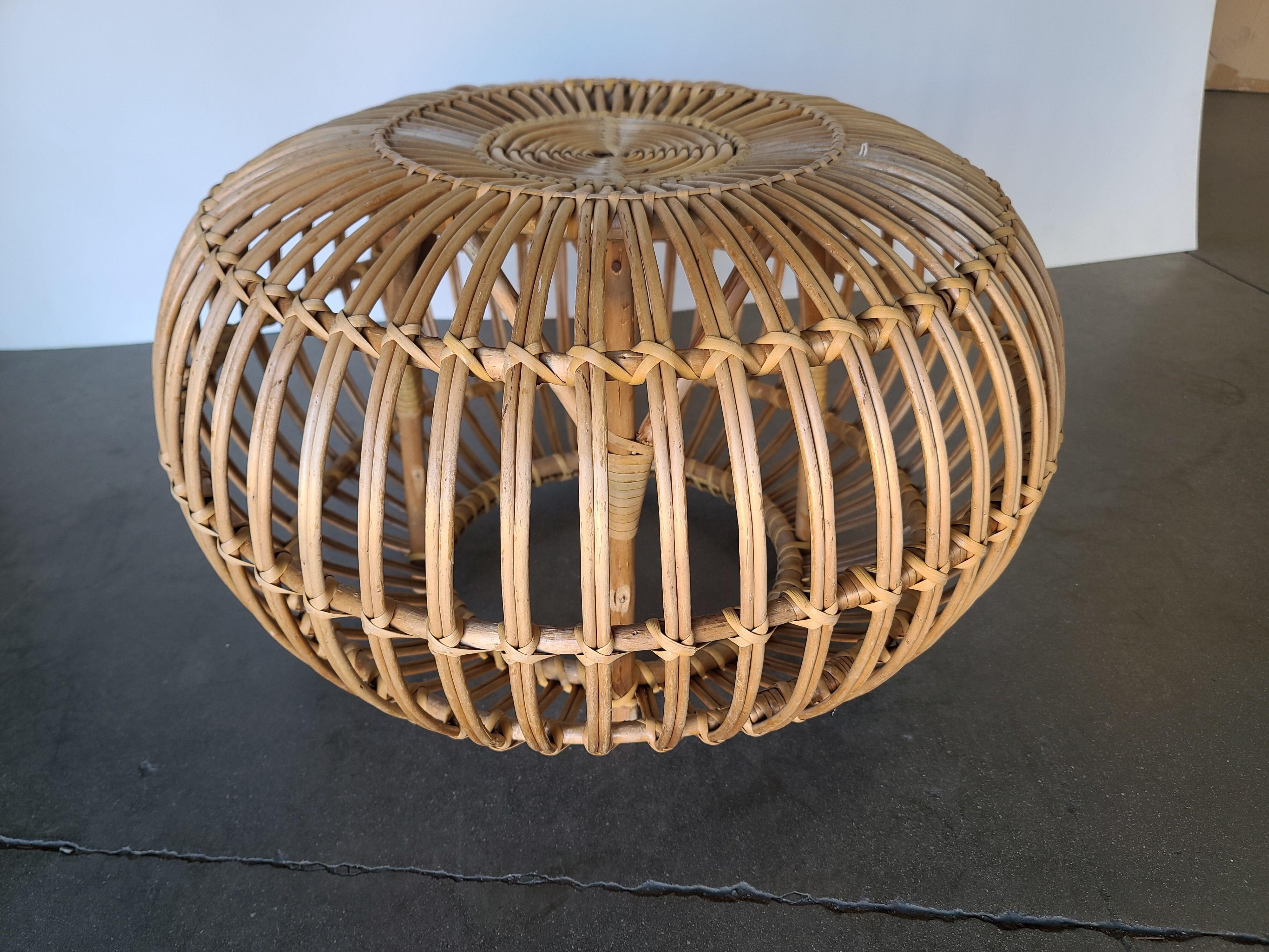 Nice 1960s Franco Albini Round ottoman or sitting stool perfect to complete your bohemian living space.
 
We only purchase and sell only the best and finest rattan furniture made by the best and most well-known American designers and manufacturers