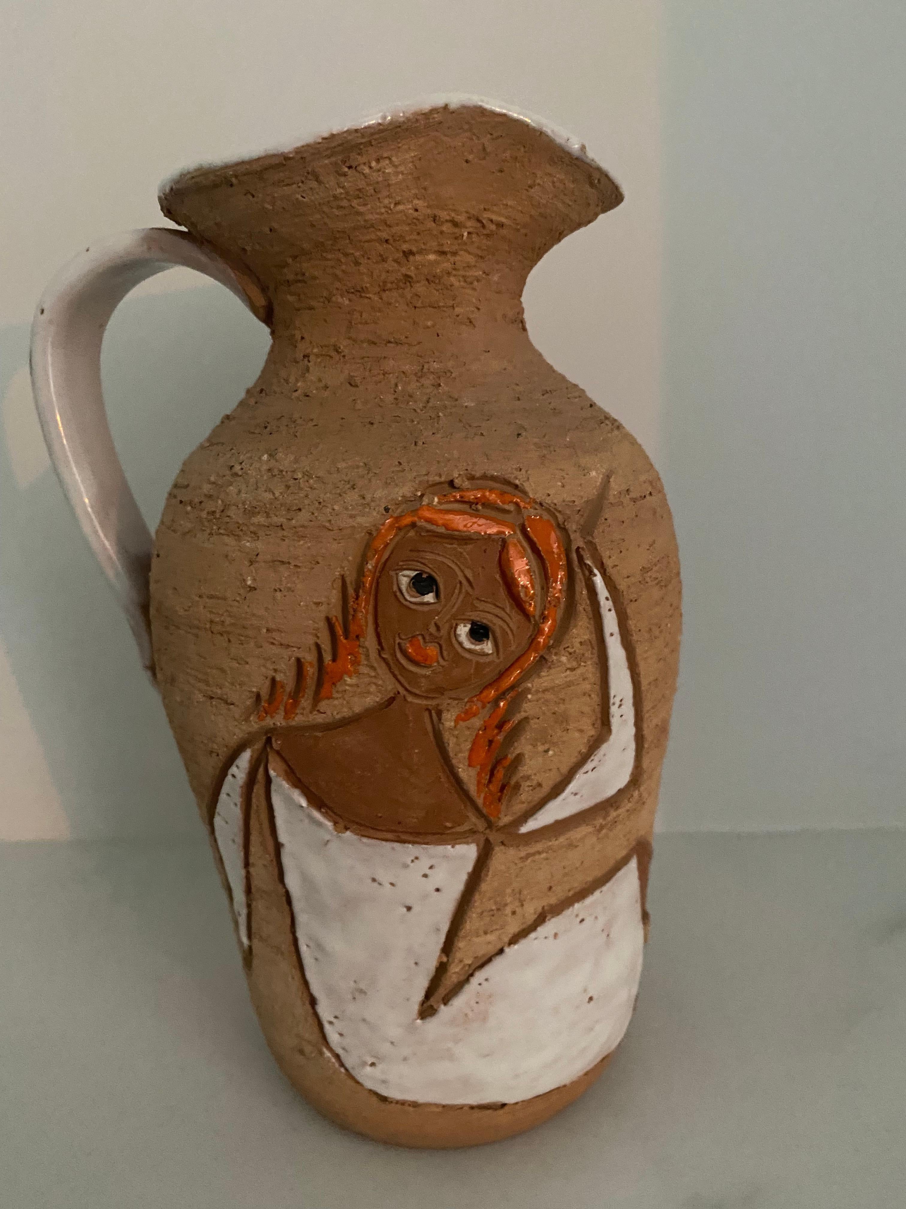 Stunning and vibrant, 19 cm high, jug vase with sgrafitto and hand-painted colored glossy pattern of stylised women. On the base is painted Italy 7872.
I have also a larger one for sale.
Fratelli Fanciullacci Pottery: during the first half of the