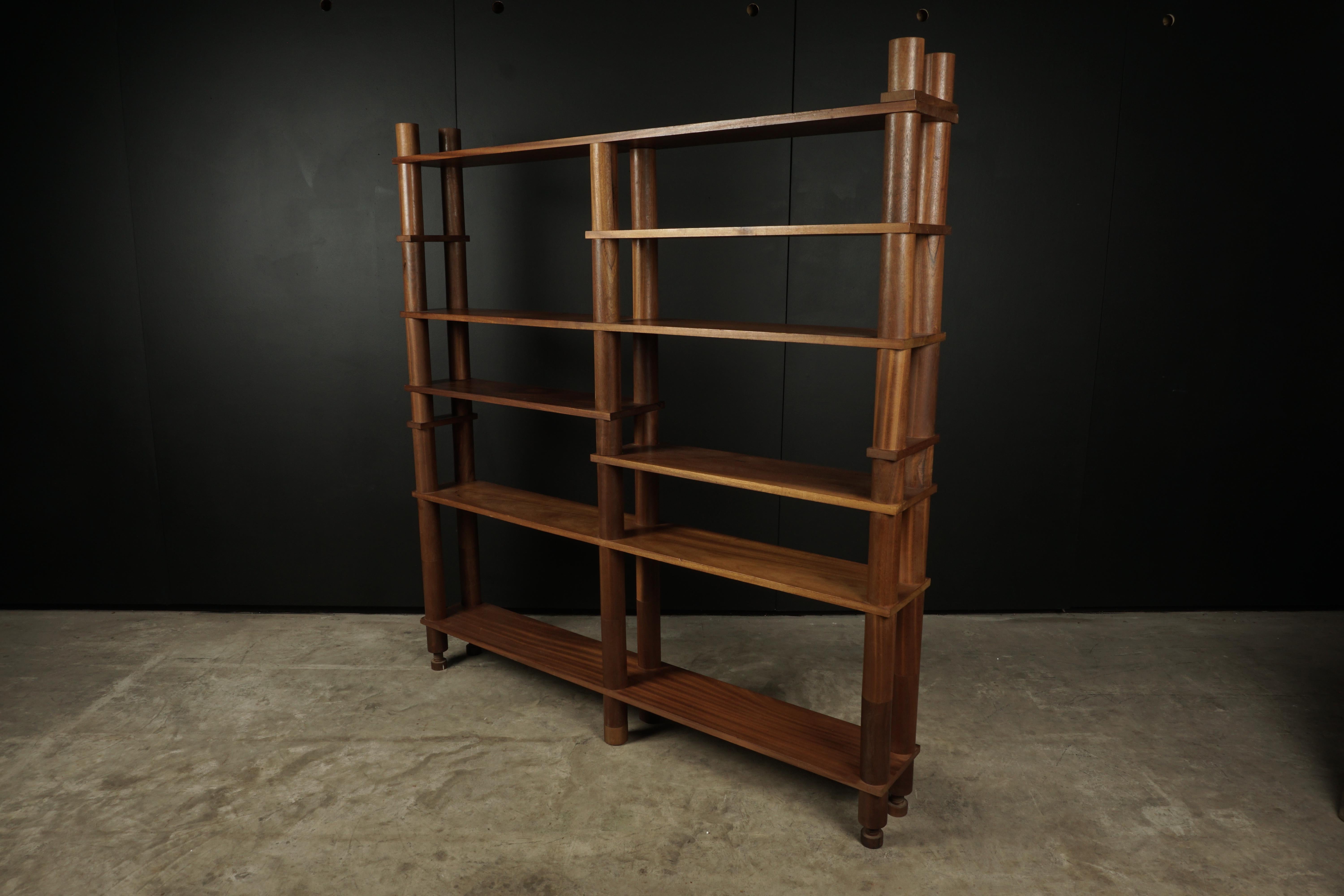 Midcentury freestanding shelf from France, circa 1960. Modular pieces that are changeable to design the shelf to your wishes. Solid teak construction.