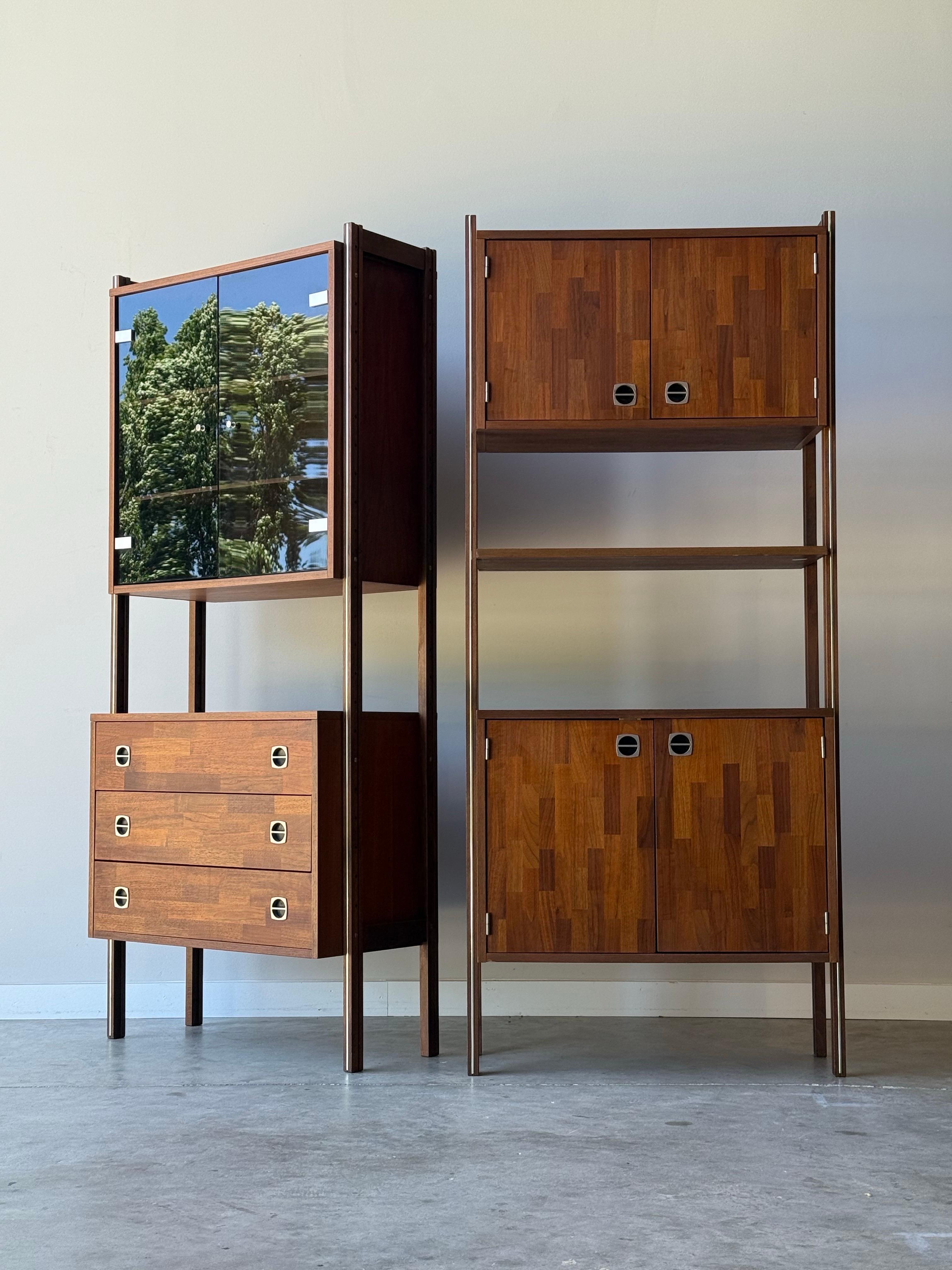 Mid-century two bay freestanding wall unit by Ello. This piece has two bays that can be combined together or separated into two units. Made from warm rich wood with chrome metal accents that pop and add a modern touch. 

Four different style cases