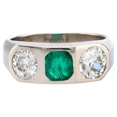 Mid Century French 2.30 carat emerald and diamond platinum three stone band
