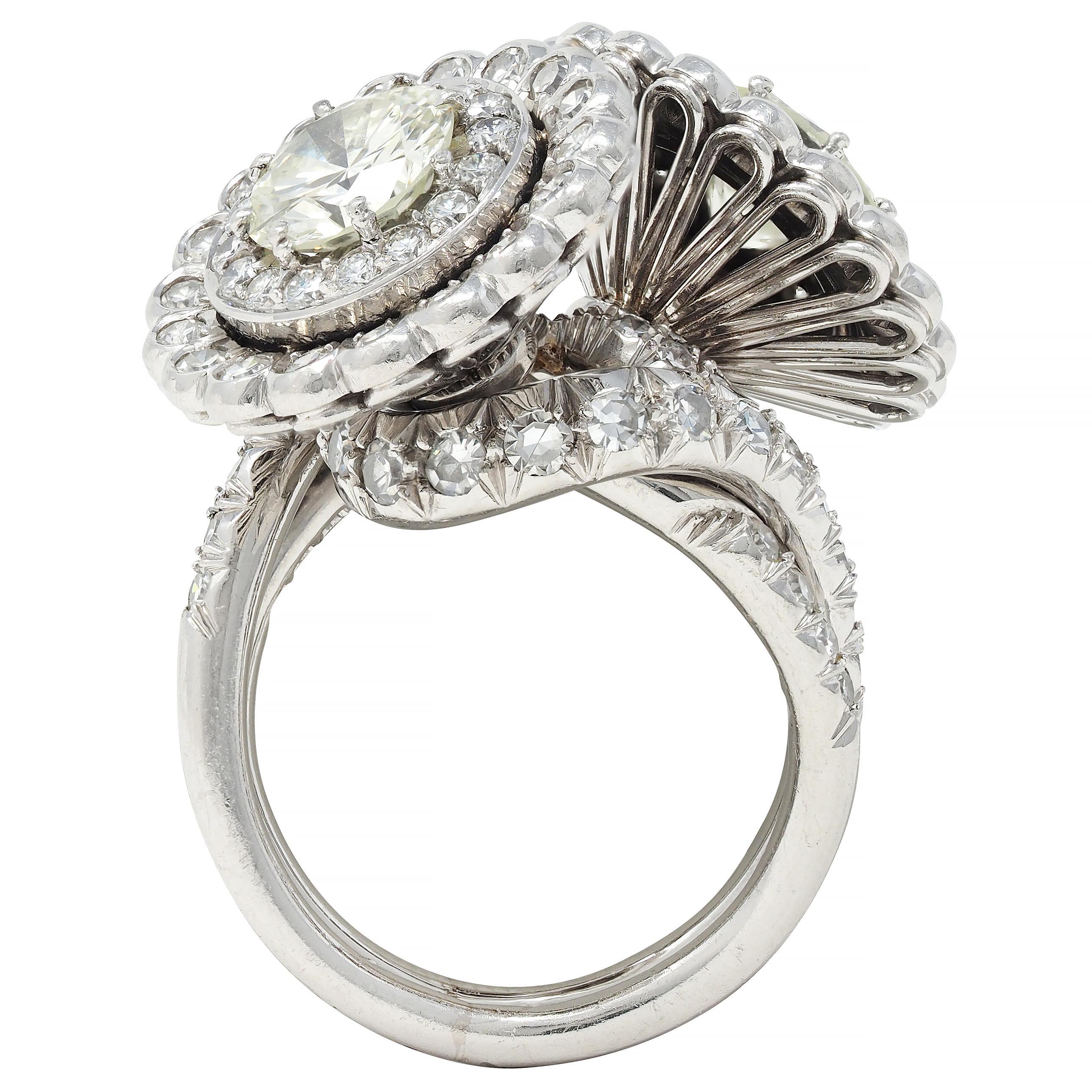 Round Cut Mid-Century French 5.85 CTW Diamond Platinum Vintage Halo Bypass Floral Ring For Sale