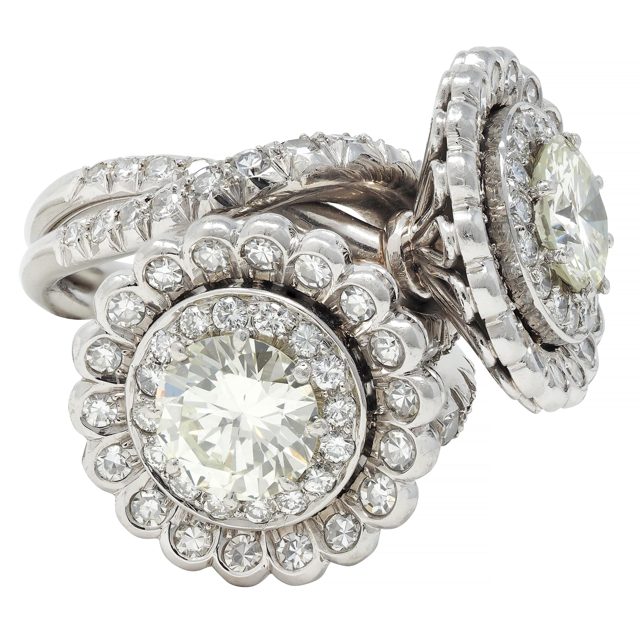 Women's or Men's Mid-Century French 5.85 CTW Diamond Platinum Vintage Halo Bypass Floral Ring For Sale
