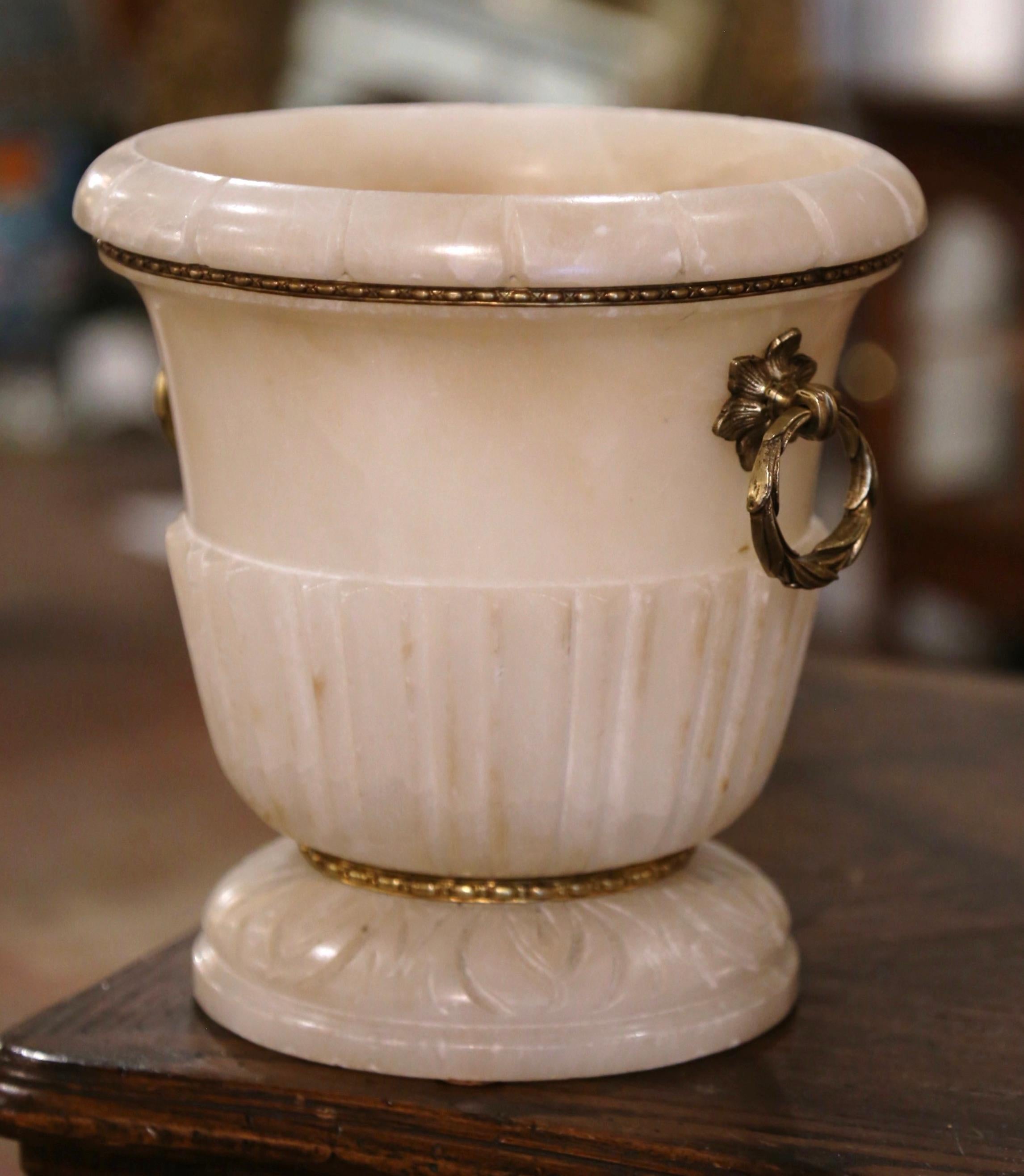 Serve champagne or white wine in style in this antique 