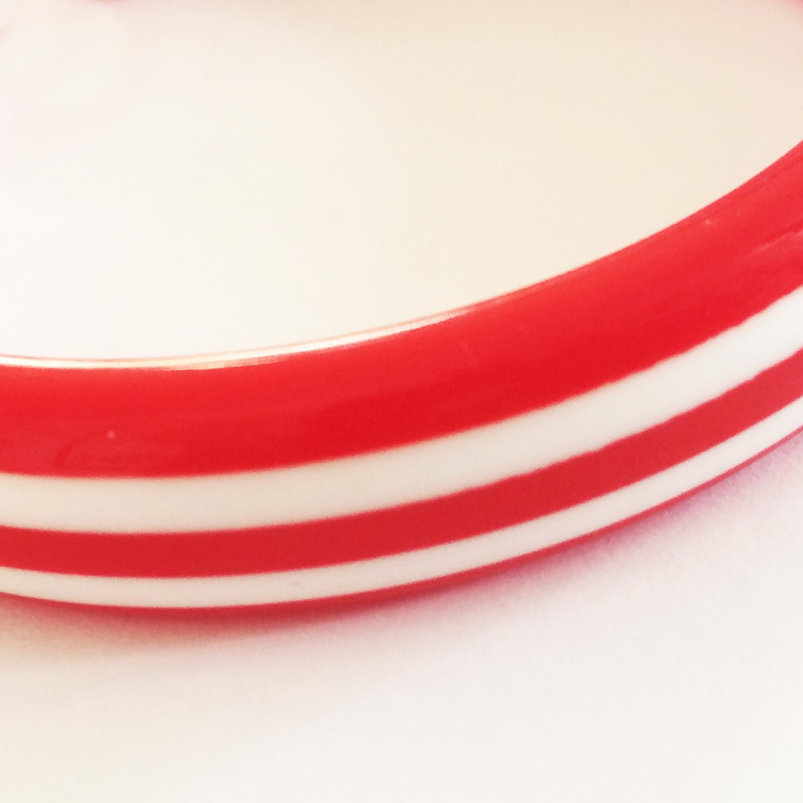 Mid Century French Bakelite Bangle in Crimson with parallel white stripes of similar width. A stunning design in a popular Deco colour and geometric stripes. Absolutely all in perfect condition, no damage or repairs. Dimensions are approx..: Inner