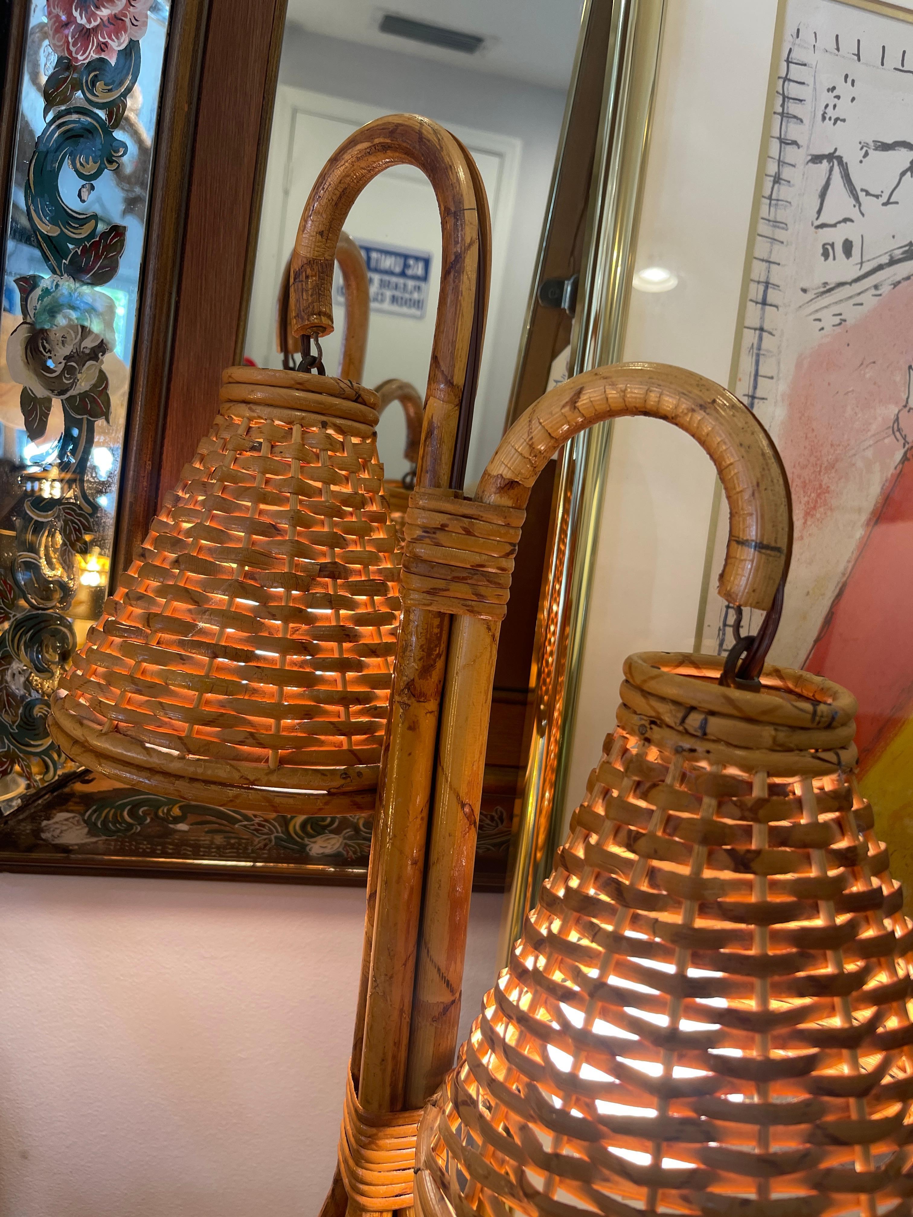 This is a charming French mid-century, C.1965 Bamboo & Rattan Double Light Table Lamp.
There are 2 bell shape original woven rattan shades attached to the central Bamboo shaft.
Recently rewired to US standards.
Very good vintage condition, original