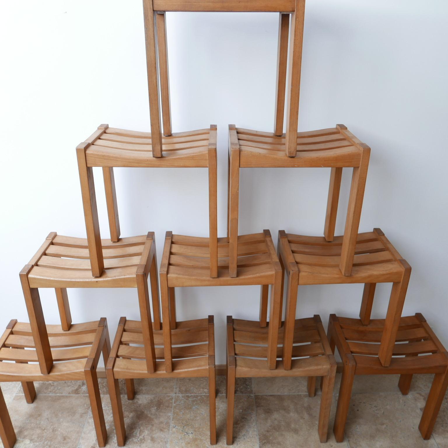 A run of up to 11 dining stools, 

circa 1960s, blonde oak. 

Good craftsmanship in the manner of Guillerme et Chambron. 

Sourced in Belgium, but likely French. 

Priced and sold individually. 

Good condition generally, some small color variances,