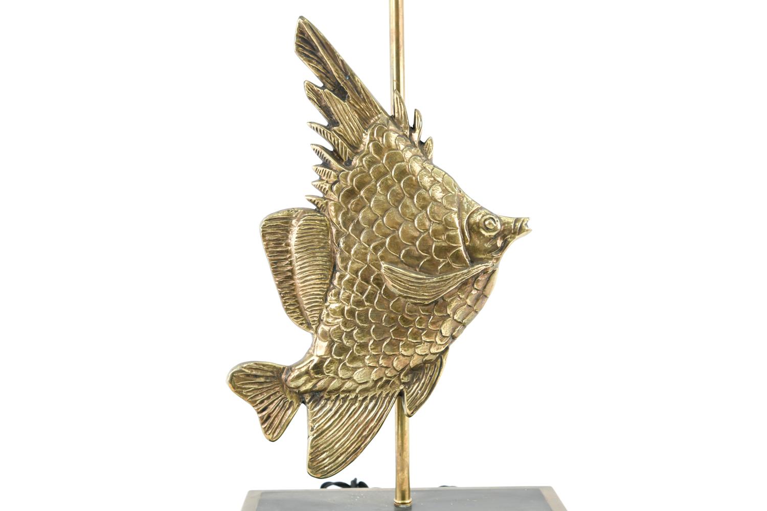 Bring the beach to your home with this fun and playful mid-century French brass lamp in the form of a fish! This lamp is ideal Palm Beach inspiration and will brighten up a room both figuratively and literally. No visible signature or maker's mark.