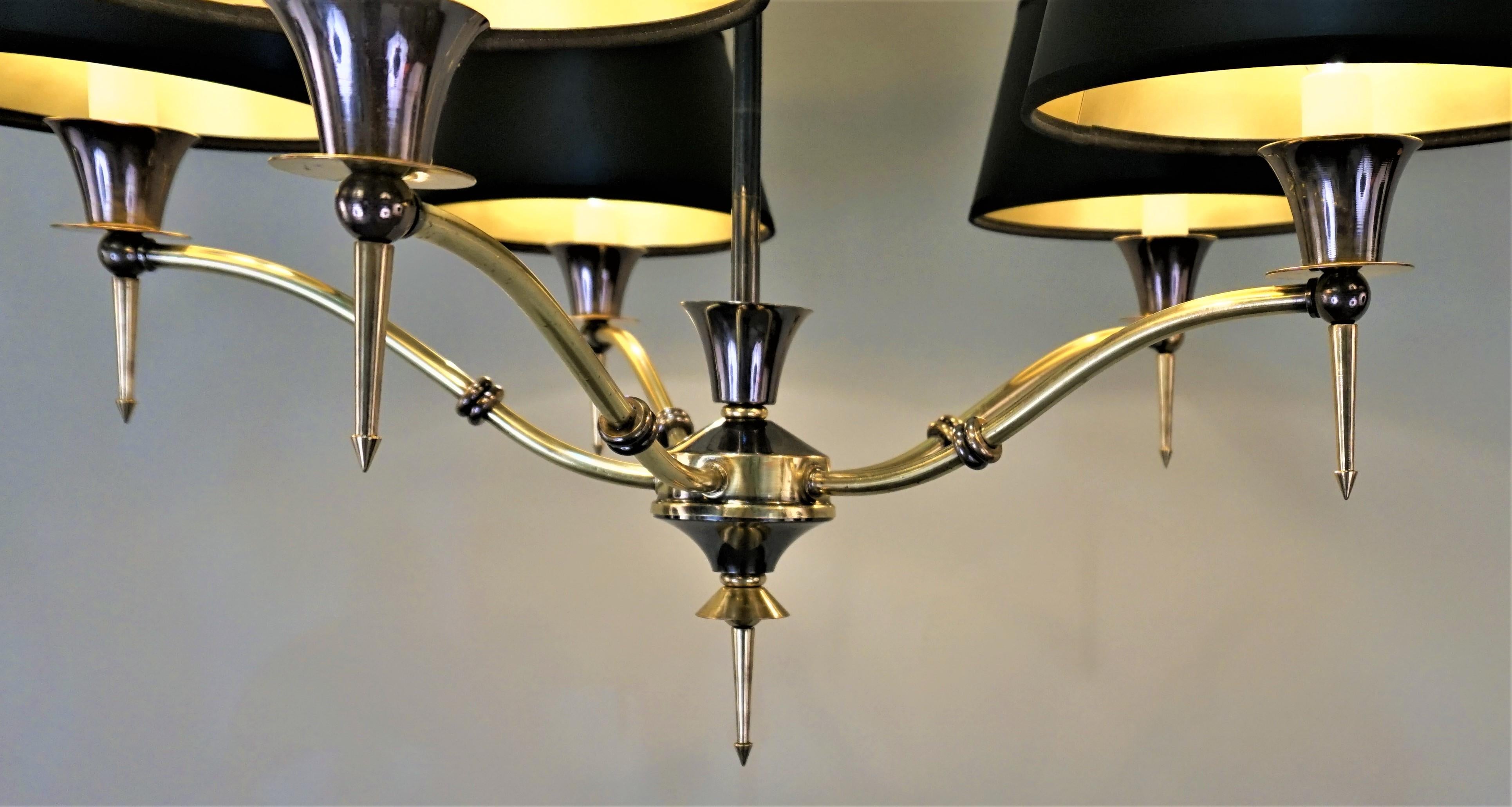 Midcentury five-light two color bronze chandelier with black lampshades
60 watt max each light.