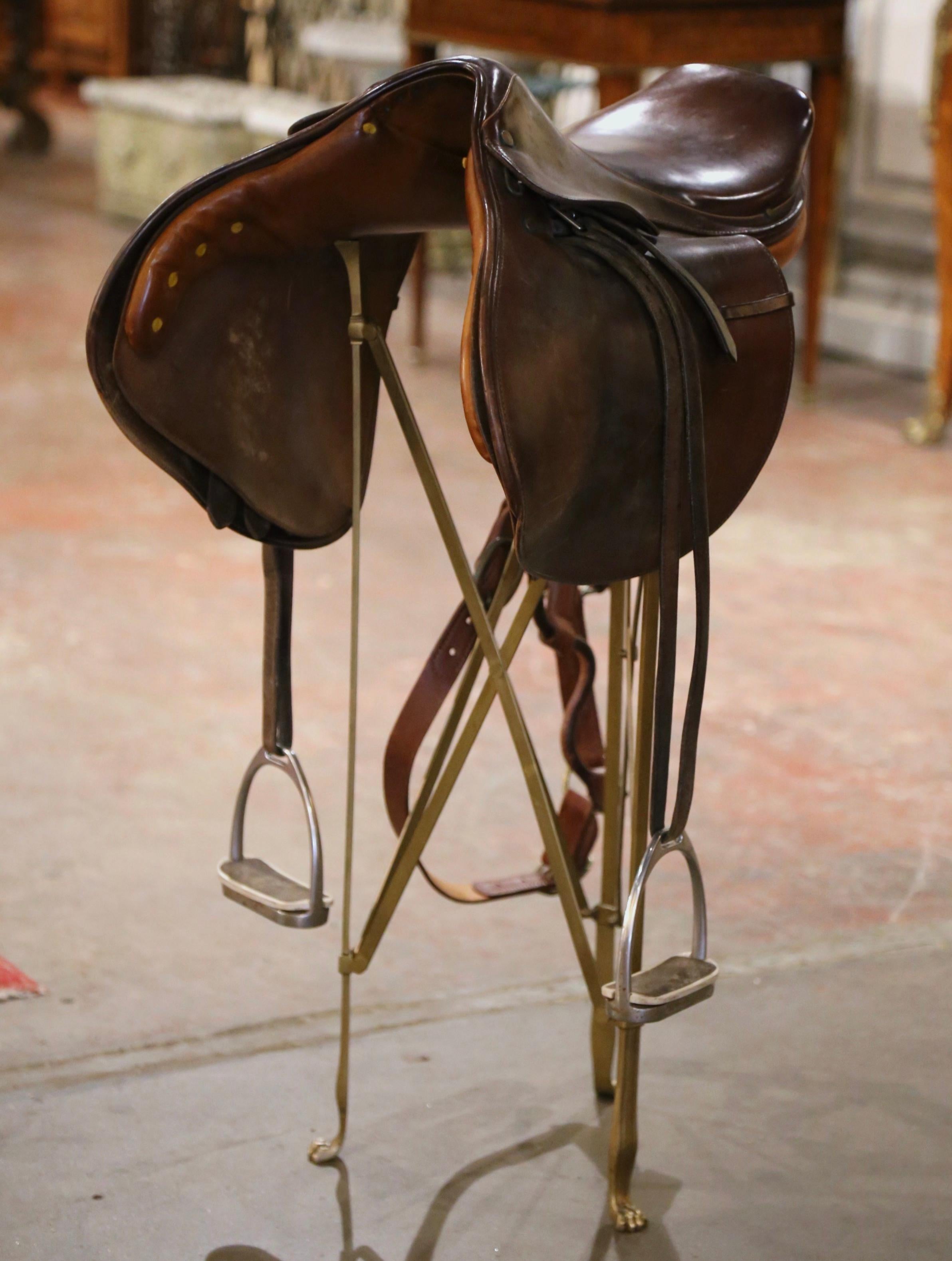 Decorate a rustic or ranch style home with this beautifully kept antique brown leather saddle from the early 20th century. Crafted circa 1950, the vintage, polo saddle is in excellent condition and adorns a rich patinated finish.
Measures: 29