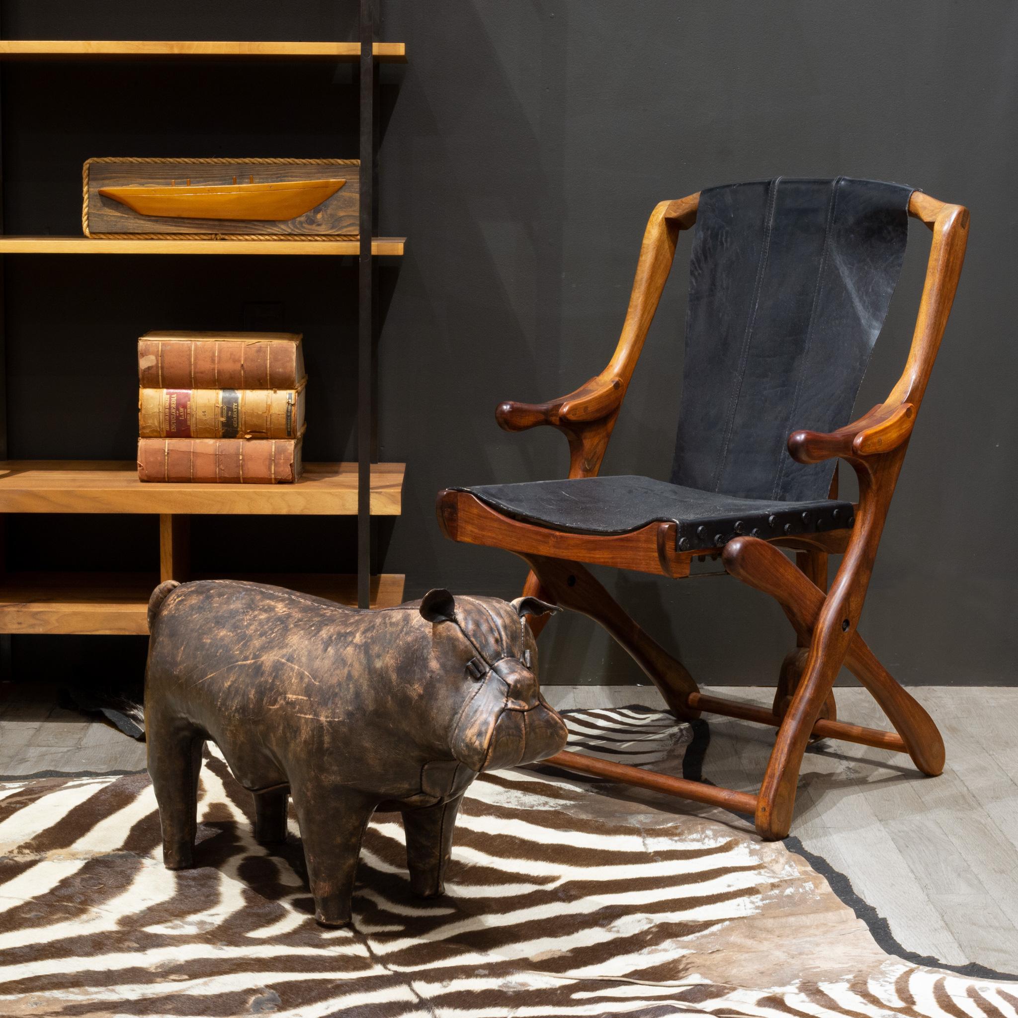 ABOUT

An original leather French Bulldog leather footstool attributed to Dimitri Omersa. 