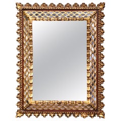 Mid-Century French Carved Giltwood Cushion Mirror with Mirrored Insets