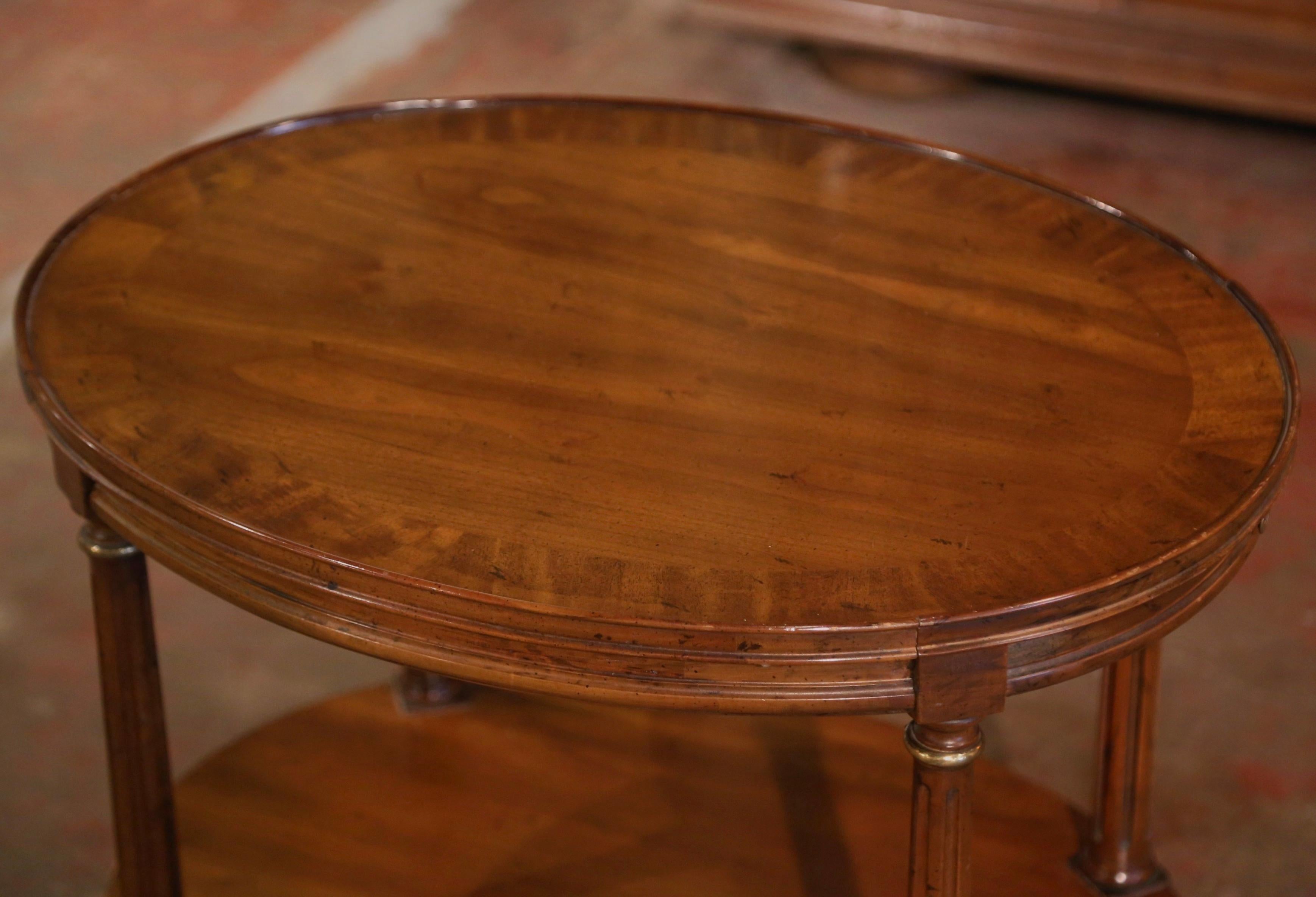Patinated Mid-Century French Carved Walnut Oval Side Table with Marquetry Decor