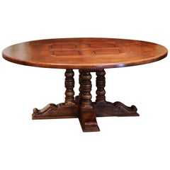 Table de salle à manger ronde à piédestal en noyer sculpté mi-siècle français, avec plateau en marqueterie