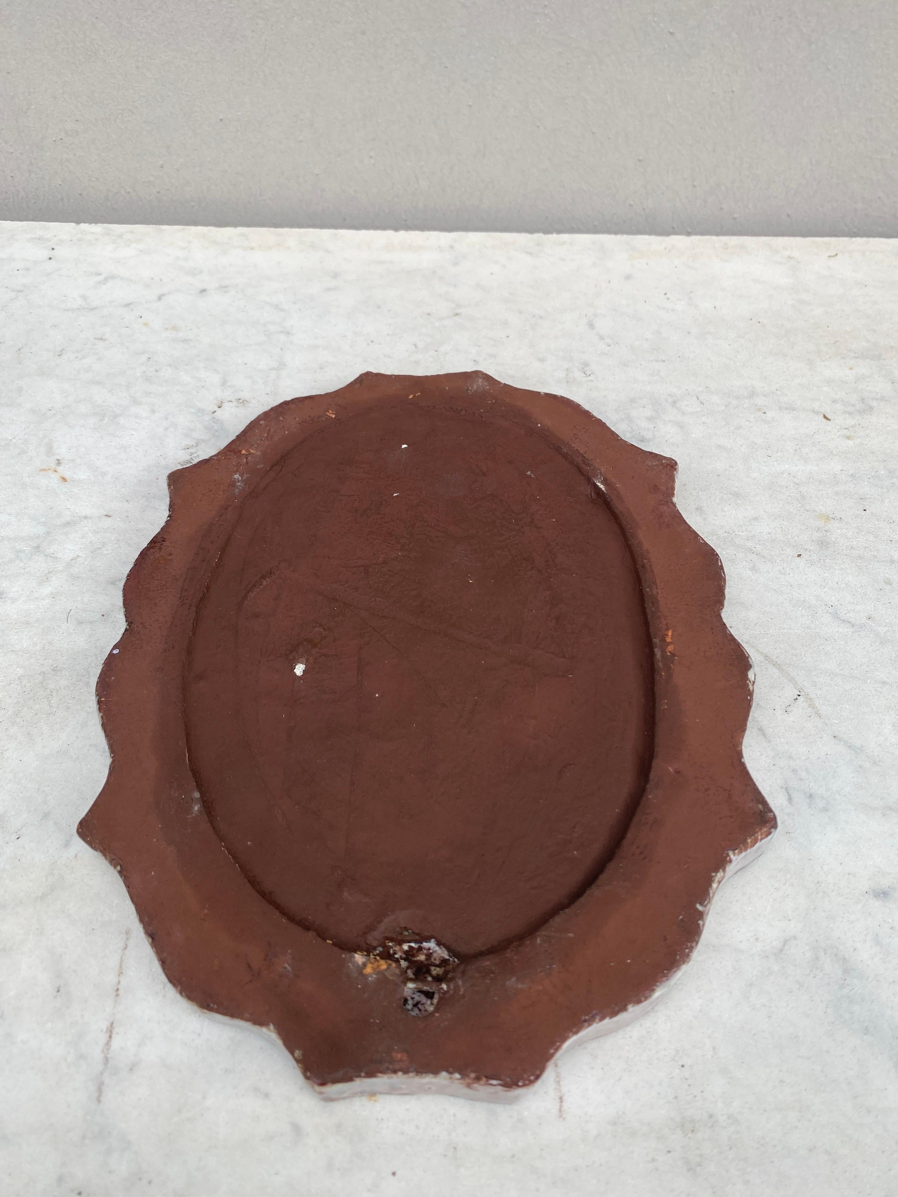 Mid-Century French Ceramic Leaves Oval Mirror  In Good Condition For Sale In Austin, TX