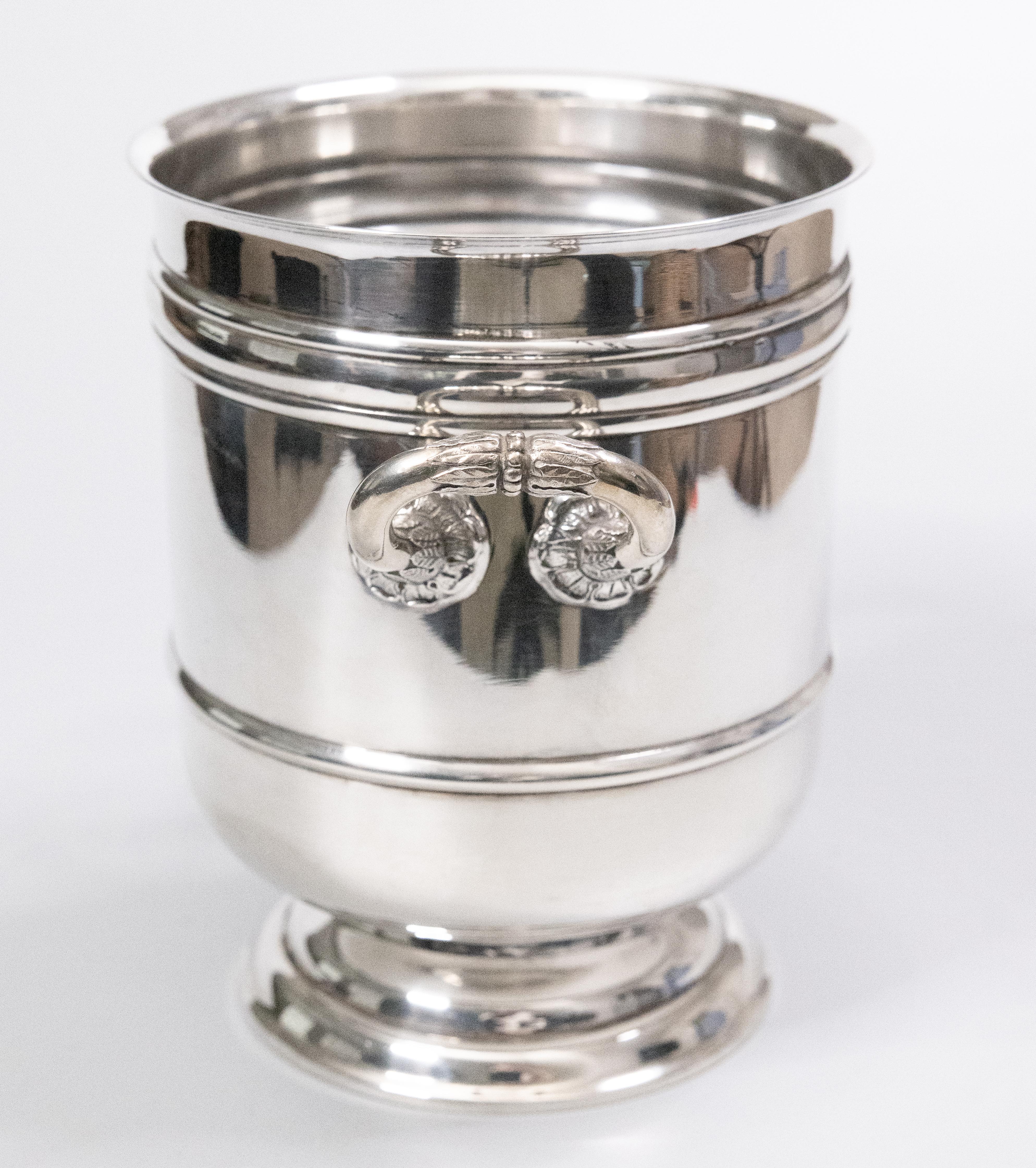 A superb vintage French Christofle silverplated petite ice bucket made in France. Hallmarked on reverse. This stylish ice bucket is solid and heavy with a sleek design, perfect for the modern home. Add the finest French silver to your barware