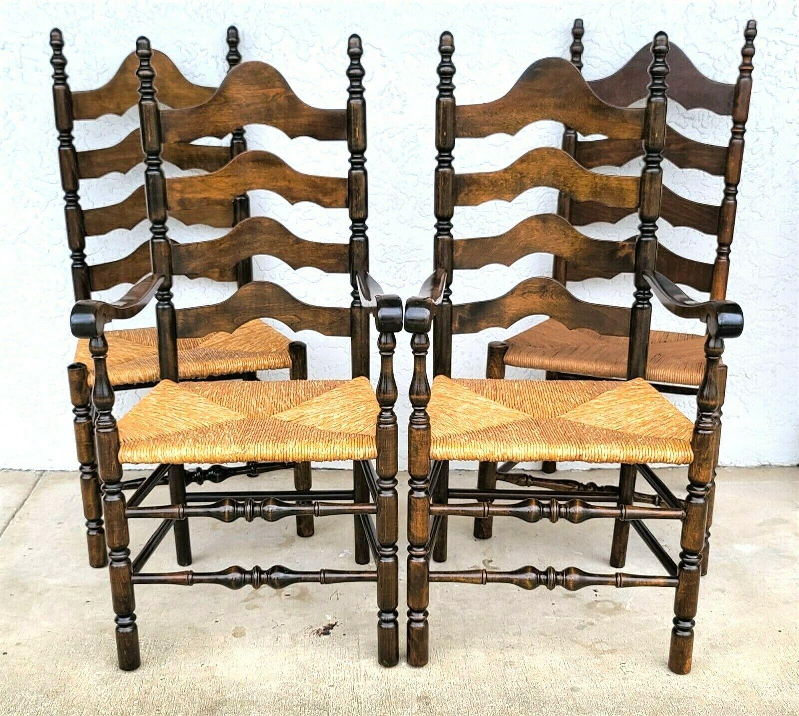 Offering one of our recent palm beach estate fine furniture acquisitions of a 
Set of 4 mid century french country ladder ribbon back rush seat dining chairs
Set includes 2 arm and 2 side chairs

Approximate Measurements in inches
Armchairs:
44.5