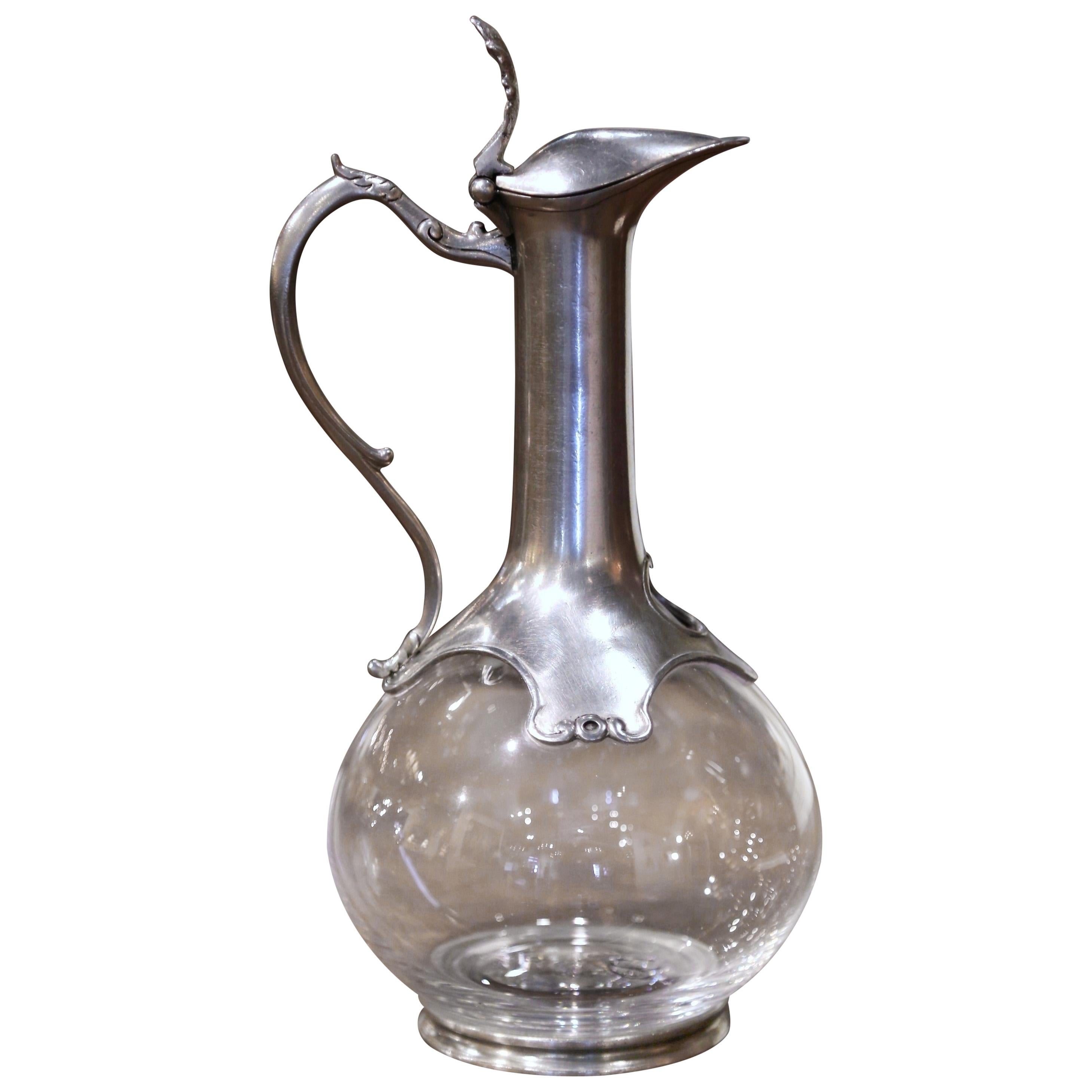 https://a.1stdibscdn.com/mid-century-french-crystal-and-pewter-wine-carafe-with-acanthus-leaf-decor-for-sale/1121189/f_241905421626374416521/24190542_master.jpeg