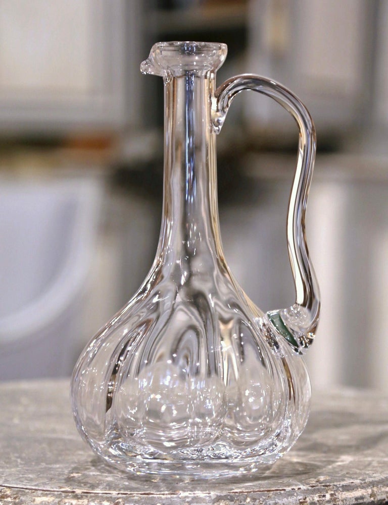 https://a.1stdibscdn.com/mid-century-french-cut-glass-wine-decanter-carafe-with-handle-for-sale-picture-4/f_9512/f_271050321644421209245/221_49_3_master.jpeg?width=768