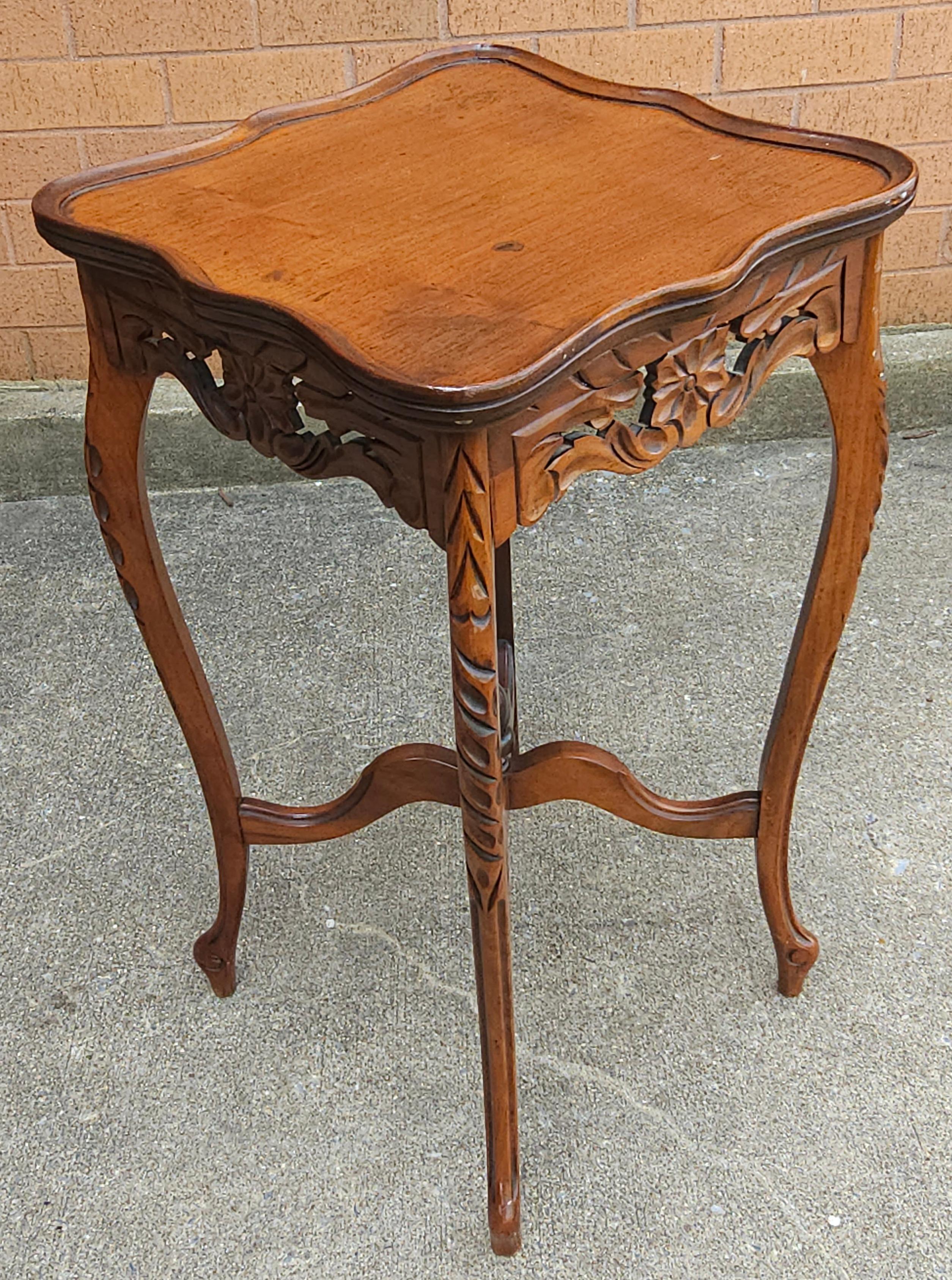 A 20th Mid Century French Empire Handcrafted, handcarved  Fruitwood Side Table with pierced galleries. 
Tables measures 14.5