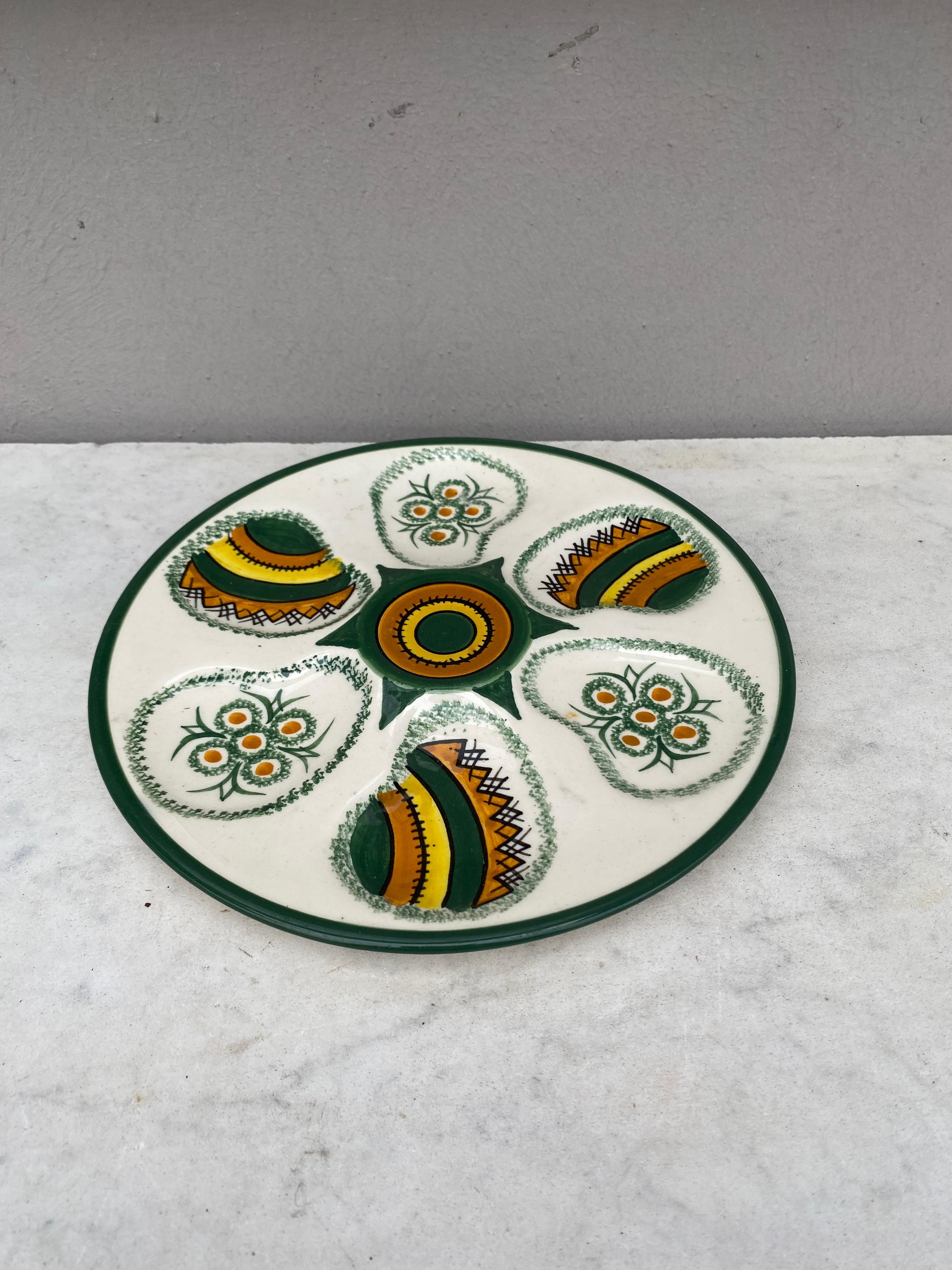 Mid-century French Faience oyster plate signed Quimper.