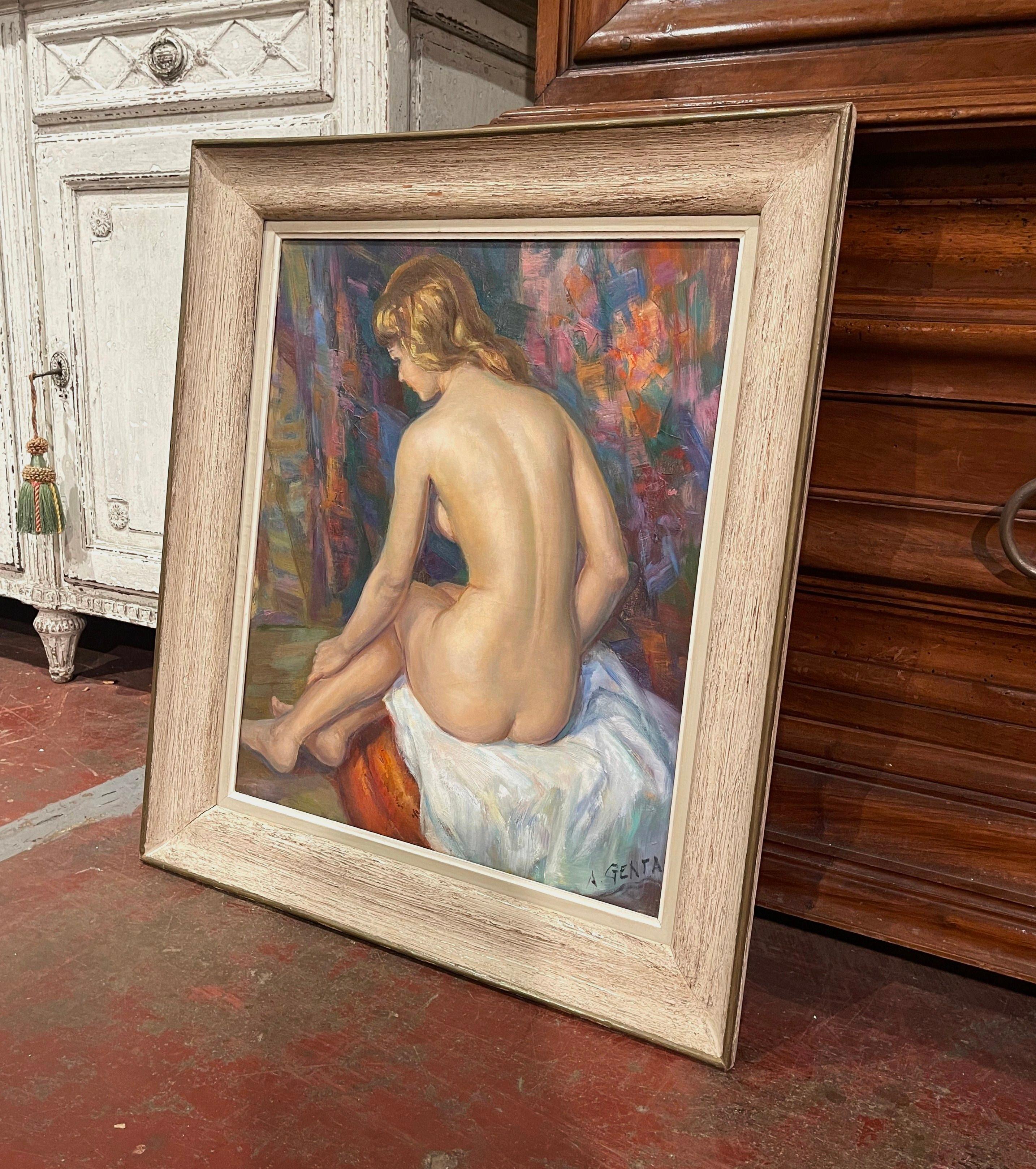 Decorate a bathroom or bedroom with this elegant oil on canvas painting. Painted in Paris, France circa 1950, and set in the original wooden frame, the artwork depicts a nude beauty sited on a stool. The painting is signed in the lower right corner