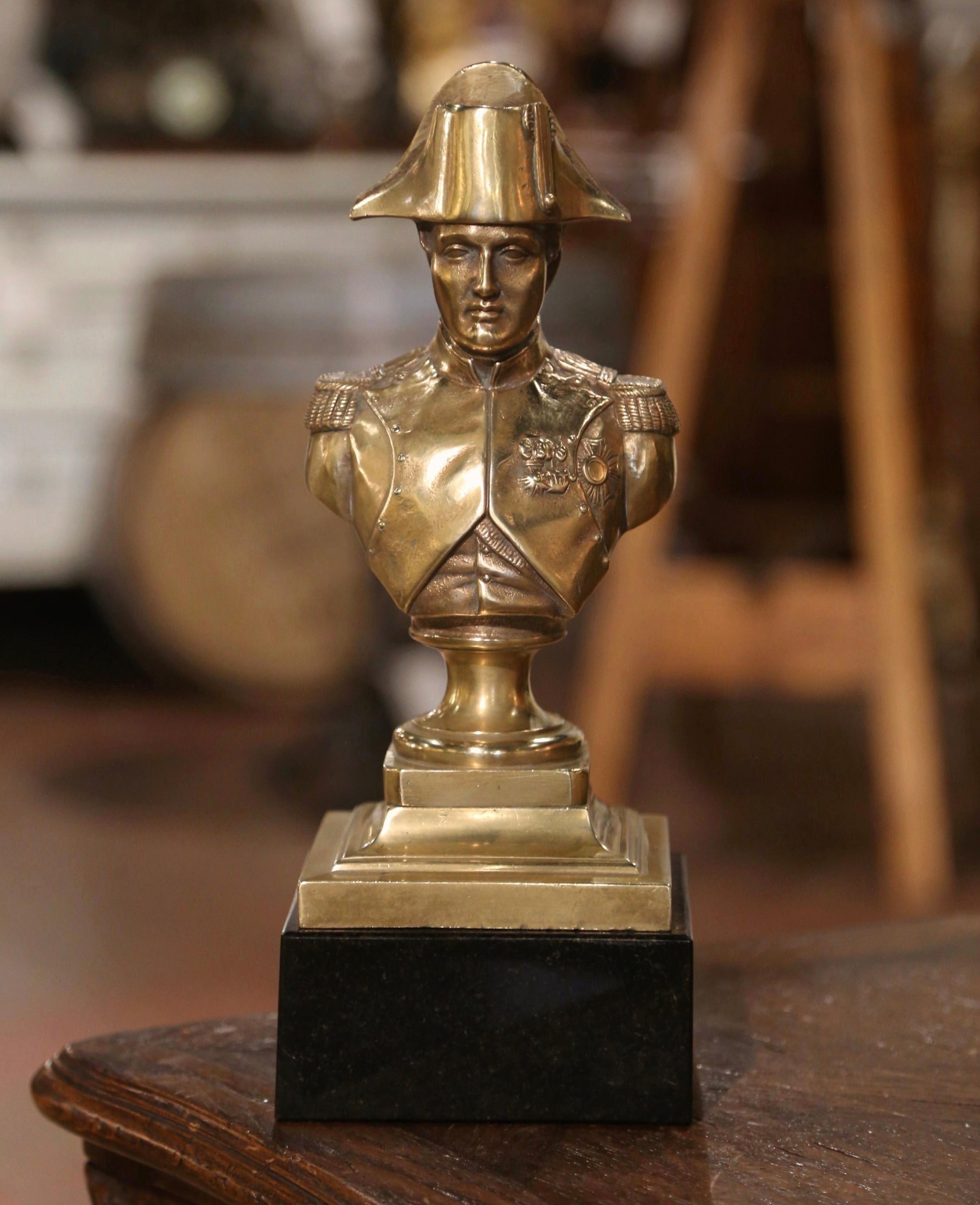 Decorate a man's office or study with this elegant antique bust. Created in France circa 1950, and built of bronze, the bust stands on a black granite base and depicts French emperor Napoleon Bonaparte. The work of art is signed on the back Ajaccio.