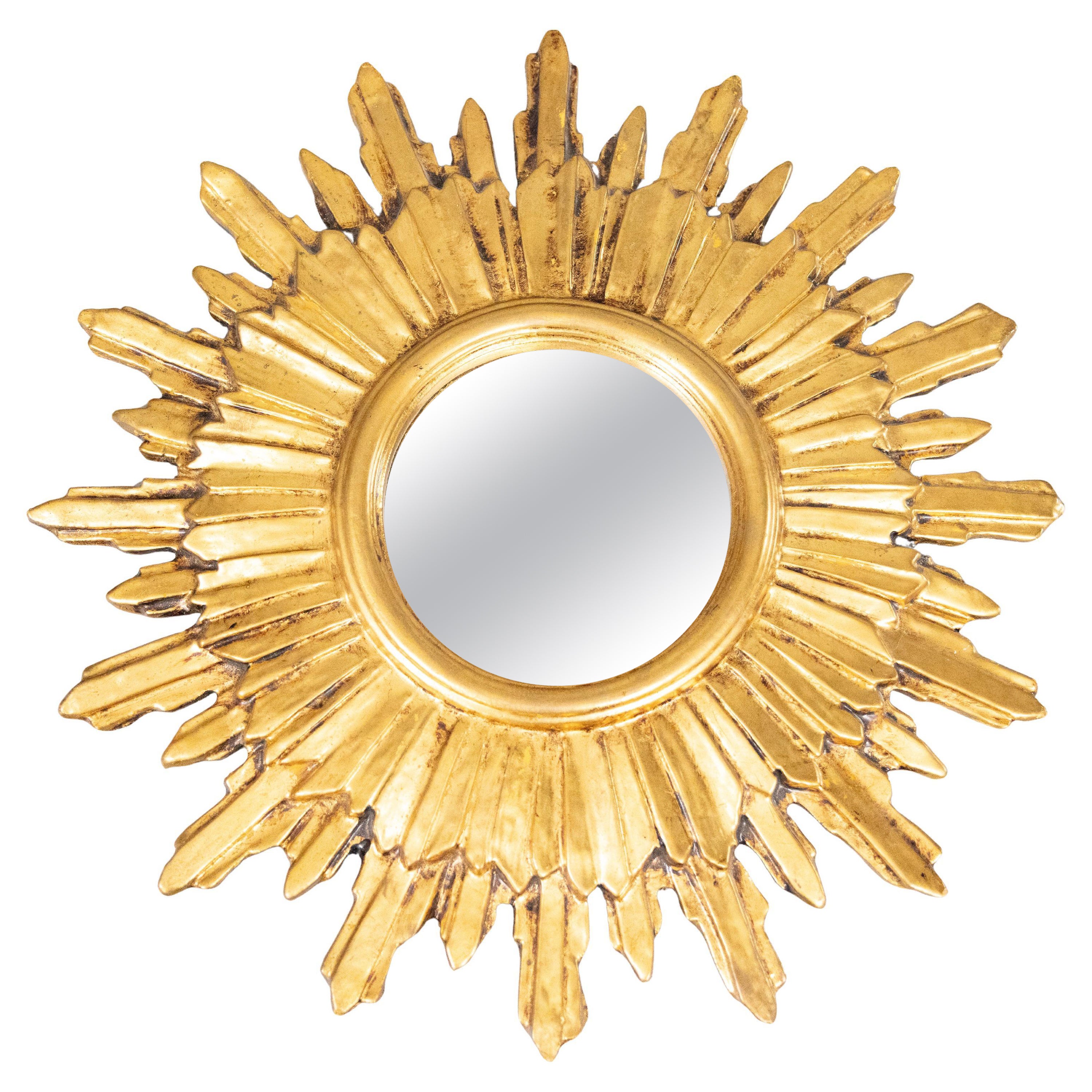 Miroir en bois doré du milieu du siècle dernier