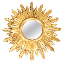 Miroir en bois doré du milieu du siècle dernier